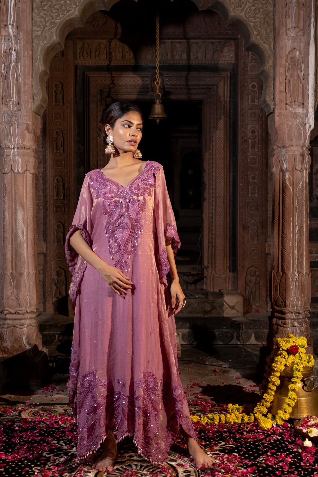 A model showcasing Lavender Pink Kaftaan Set by Farha Syed from Farha Syed's collection