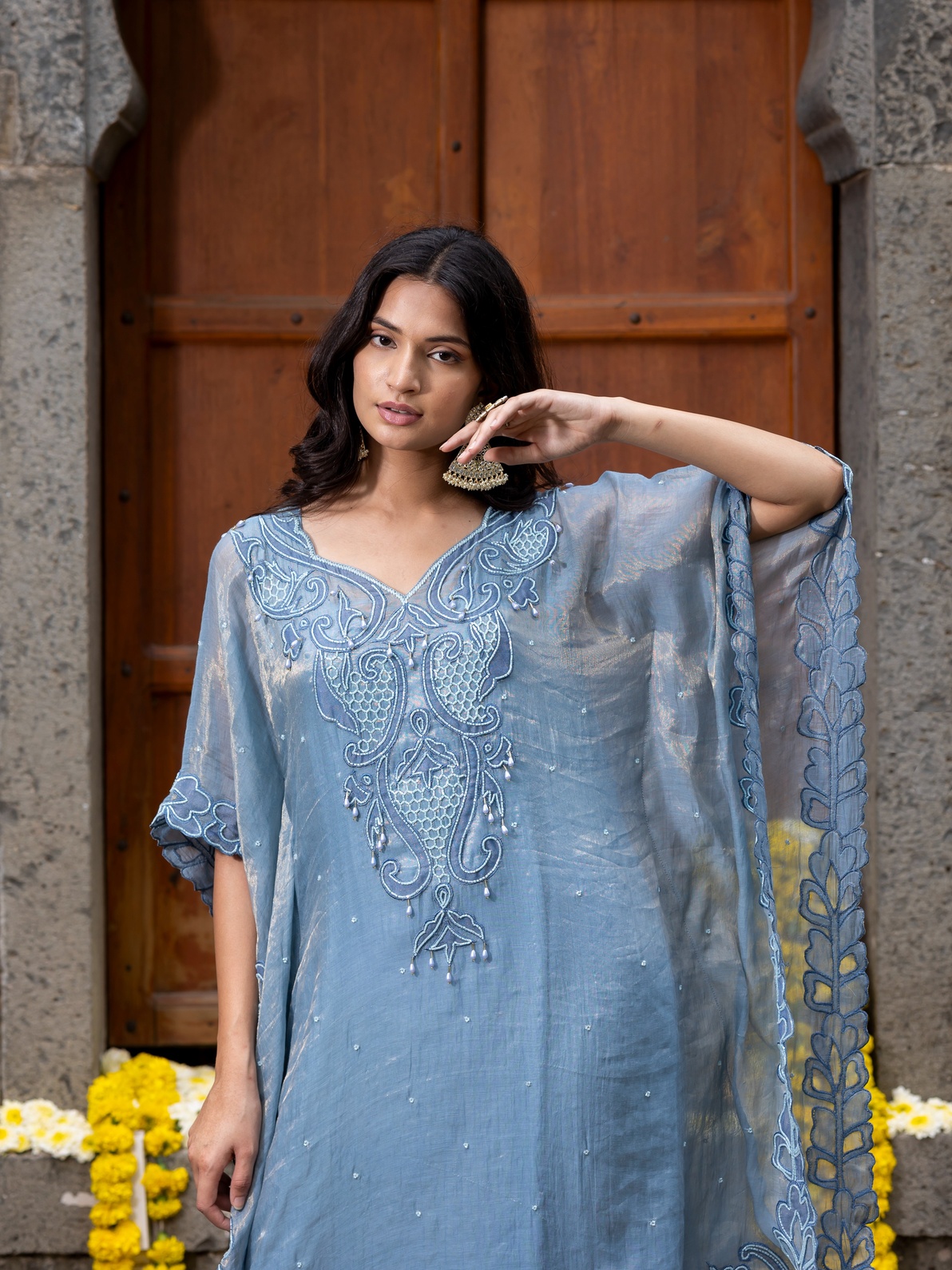 A model showcasing Blue Kaftaan Set by Farha Syed from Farha Syed's collection