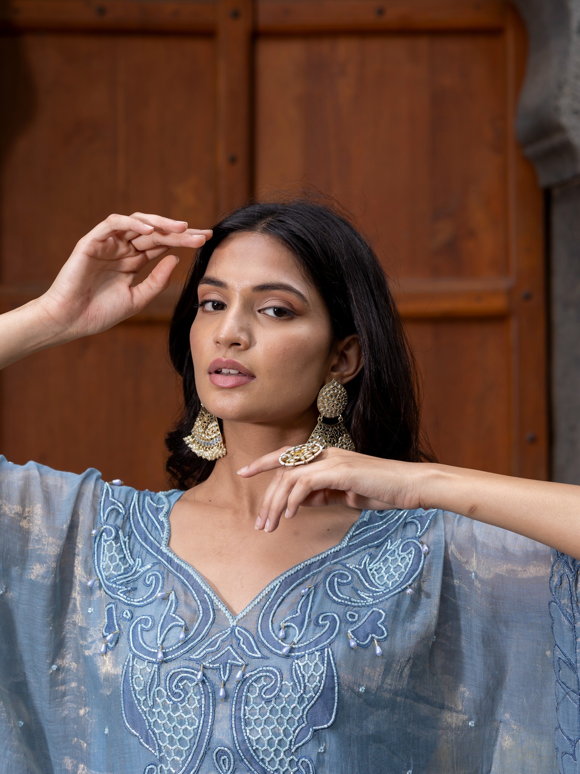 A model showcasing Blue Kaftaan Set by Farha Syed from Farha Syed's collection