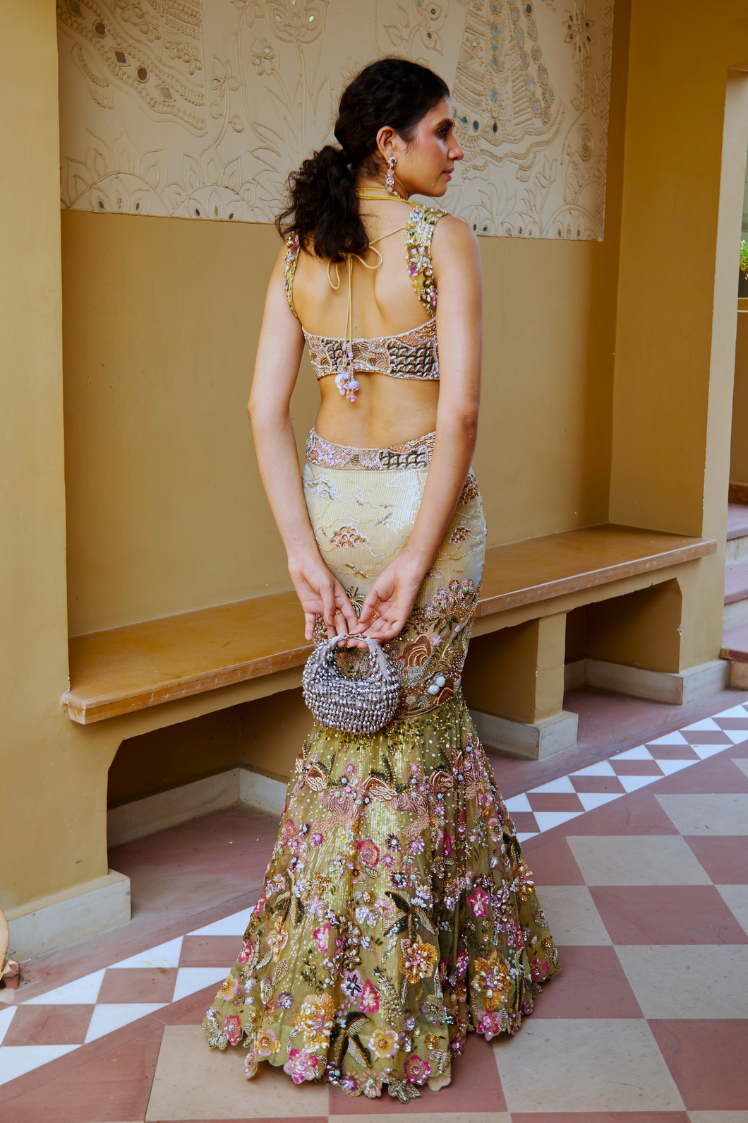 A model showcasing Elegant Fishcut Mermaid Lehenga With Intricate Detailing by Moledro from Moledro's collection