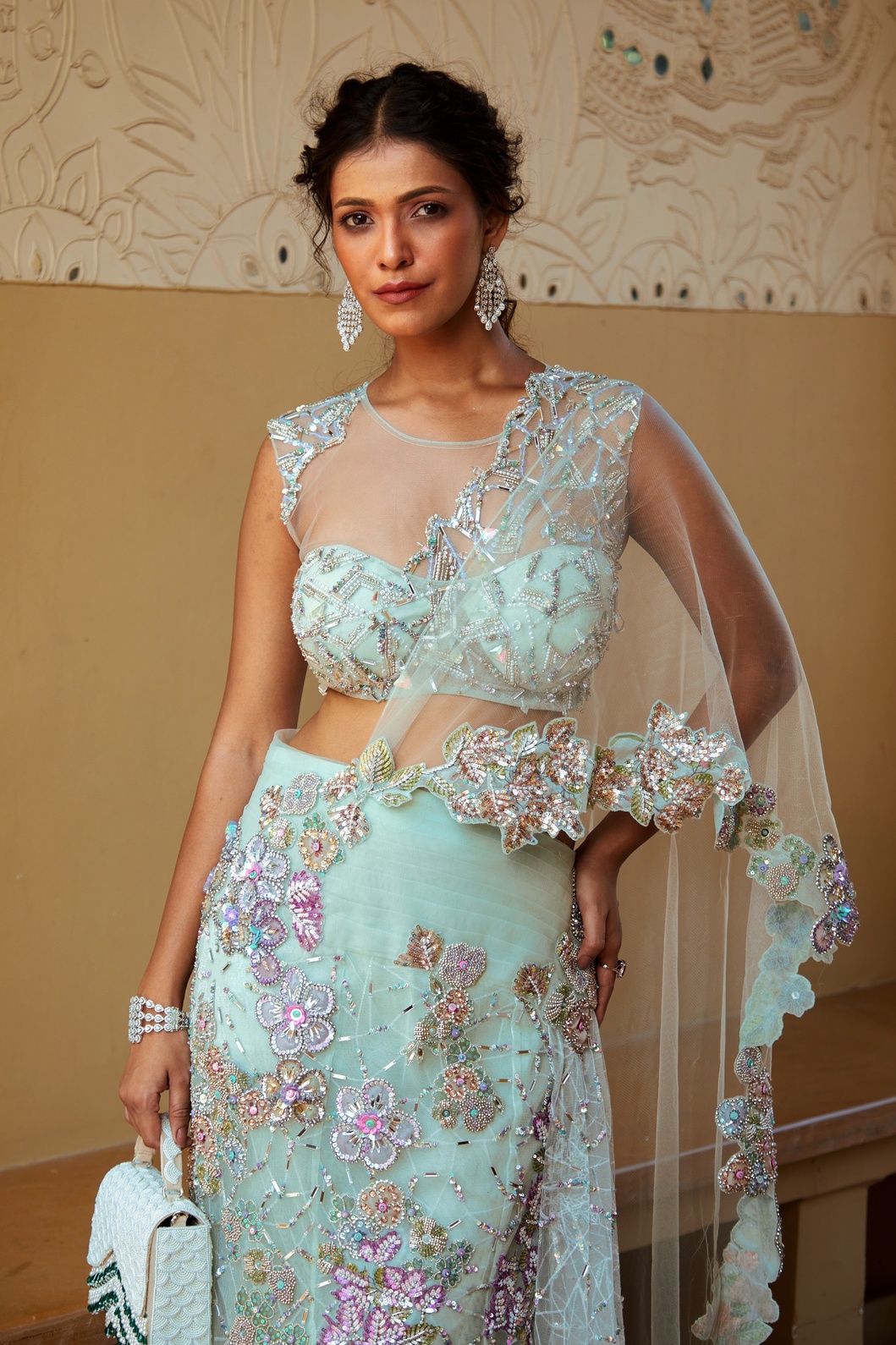 A model showcasing Elegant Aqua Soiree Look Sparkle With Sequins Crystals by Moledro from Moledro's collection