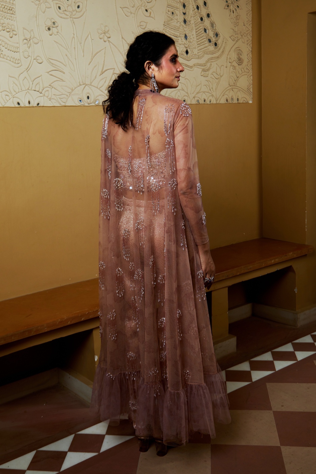 A model showcasing Beige Chic Coord Set With Sequins Crystal Detailing by Moledro from Moledro's collection