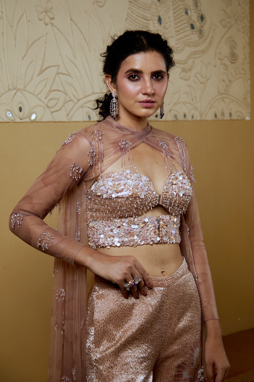 A model showcasing Beige Chic Coord Set With Sequins Crystal Detailing by Moledro from Moledro's collection