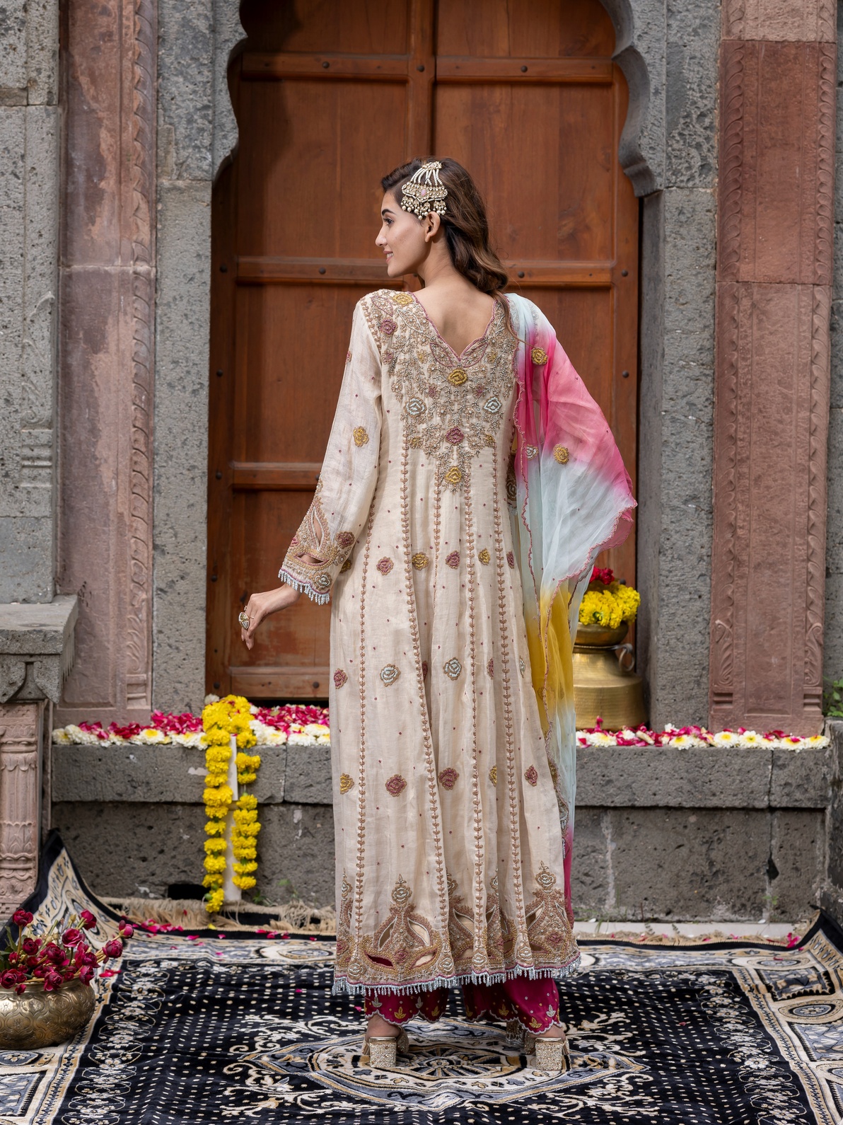 A model showcasing Elegance In Threads Chanderi Silk Beige Anarkali Set by Farha Syed from Farha Syed's collection