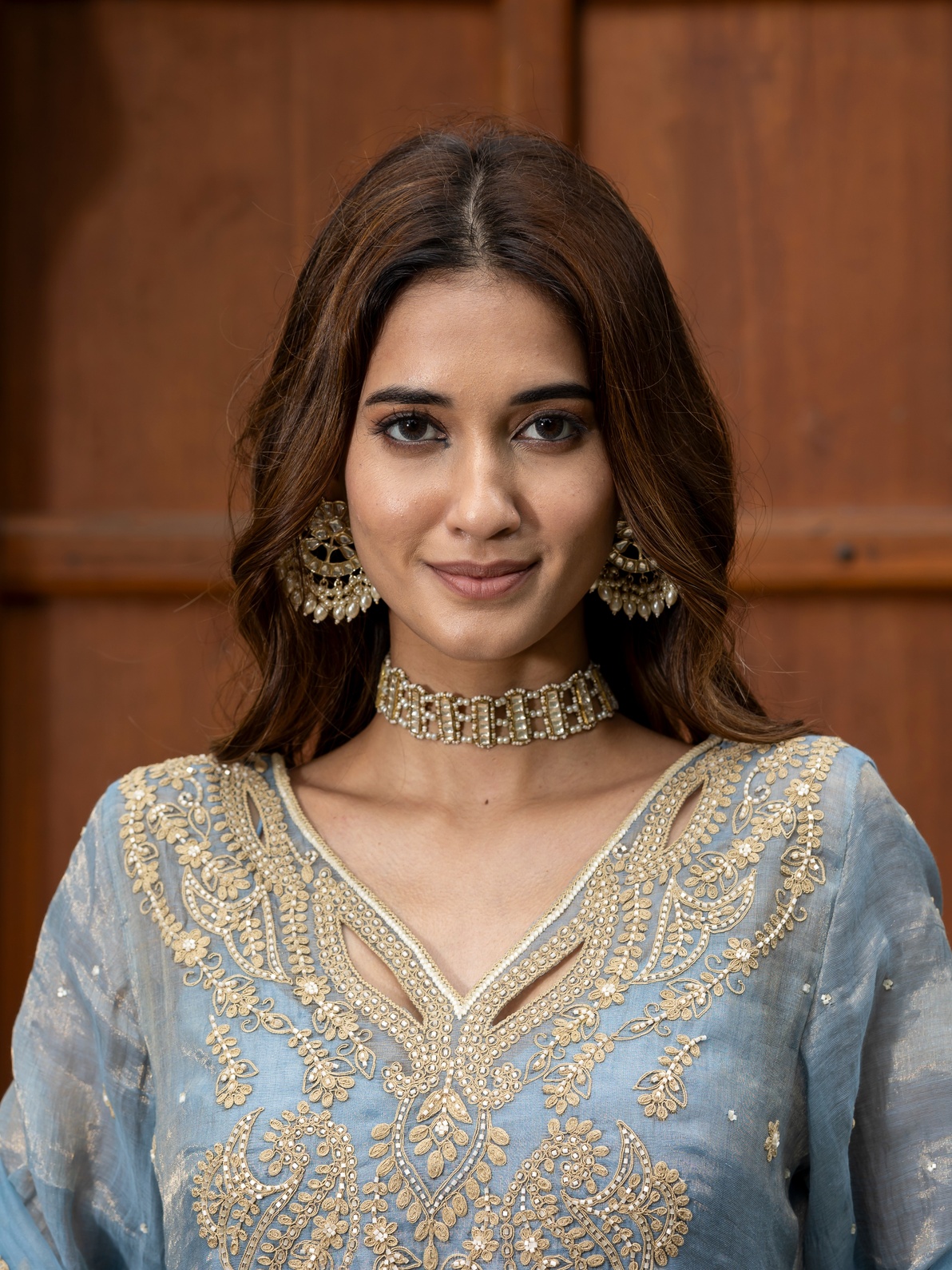A model showcasing Blue Embroidered Sharara Set With Organza Dupatta by Farha Syed from Farha Syed's collection