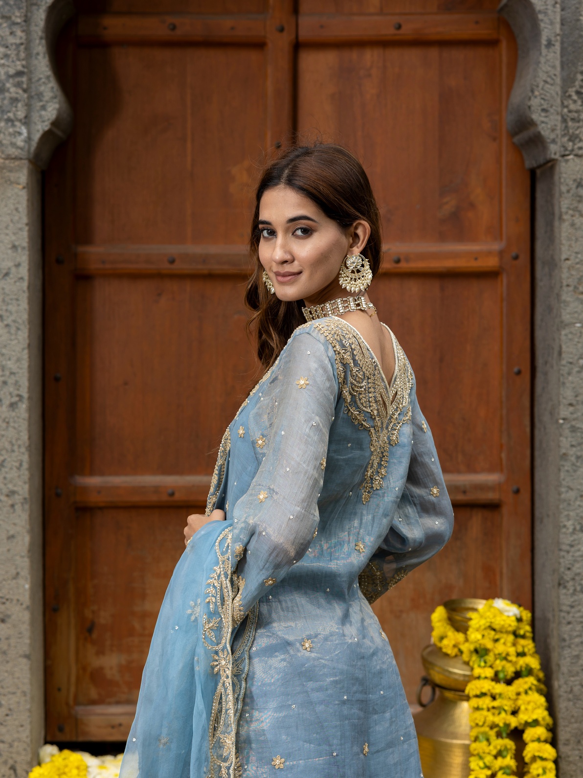 A model showcasing Blue Embroidered Sharara Set With Organza Dupatta by Farha Syed from Farha Syed's collection