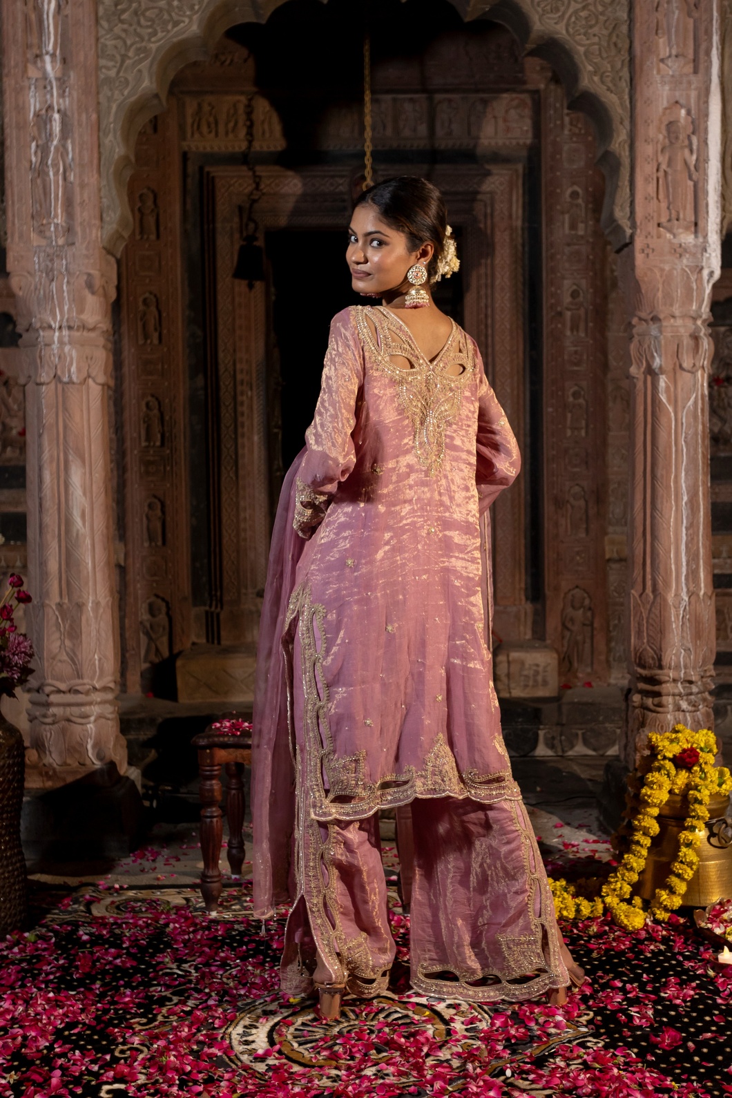 A model showcasing Dori Cutwork Pink Kurta Pants Set by Farha Syed from Farha Syed's collection