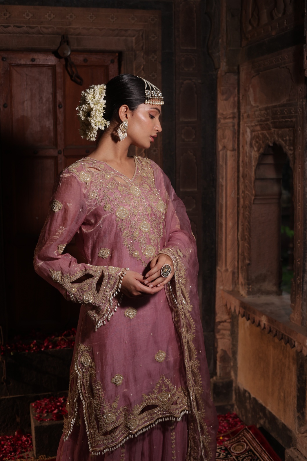 A model showcasing Hand Embroidered Kurta With Sharara Set by Farha Syed from Farha Syed's collection