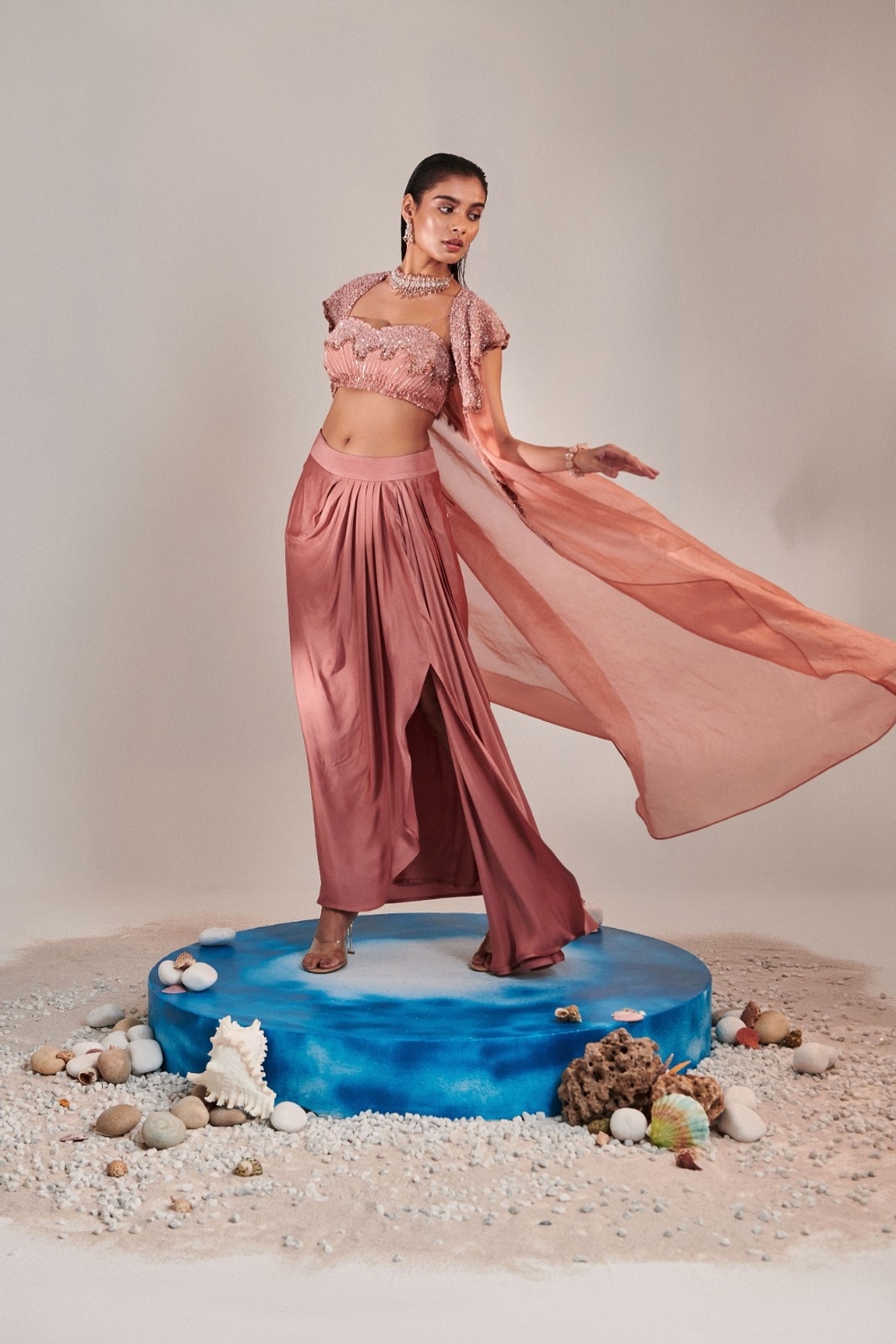 A model showcasing Salmon Pink Cape And Embroidred Blouse Feature image by One Knot One from One Knot One's collection