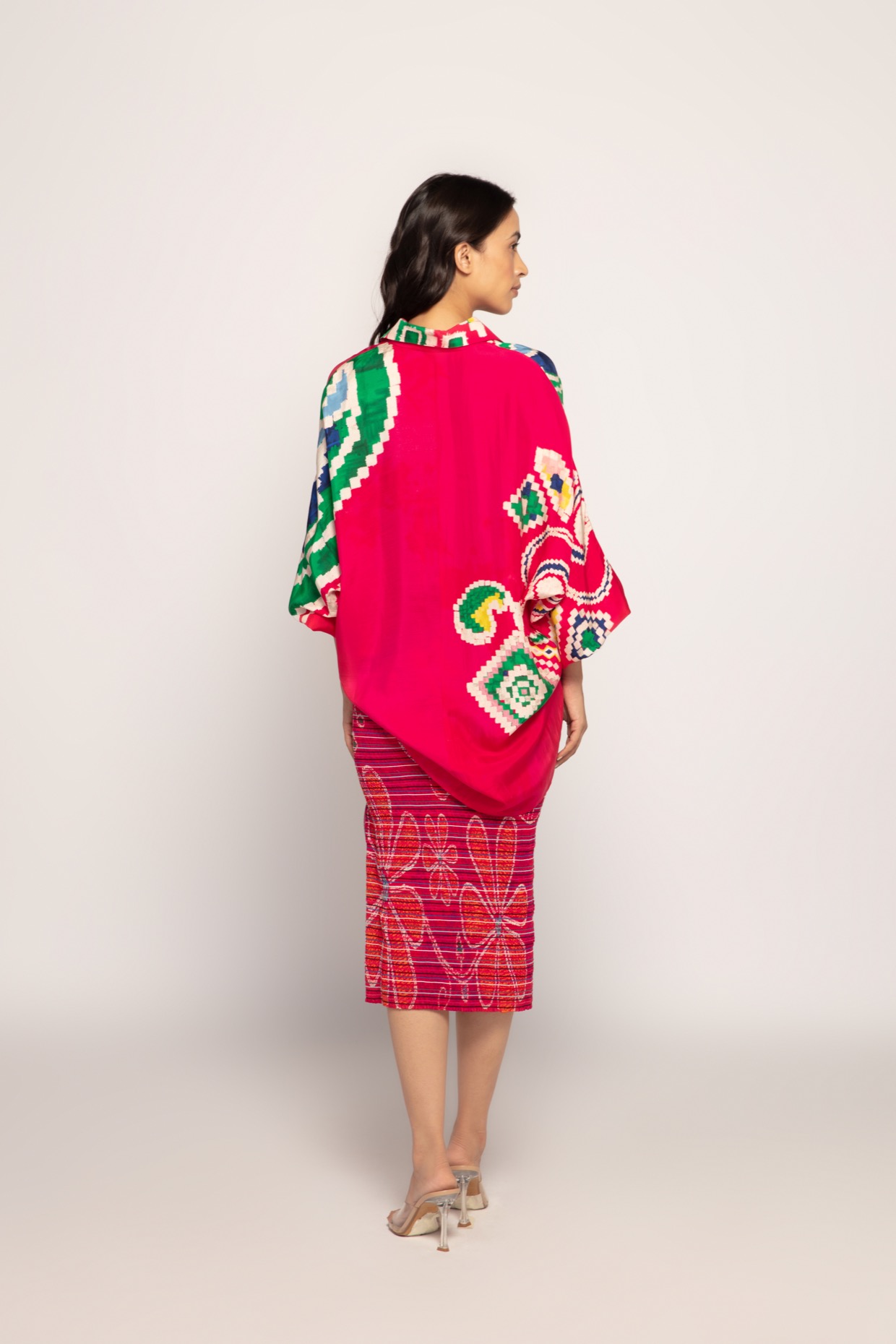 A model showcasing Paisley Print Pink Batwing Shirt by Saaksha And Kinni from Saaksha And Kinni's collection