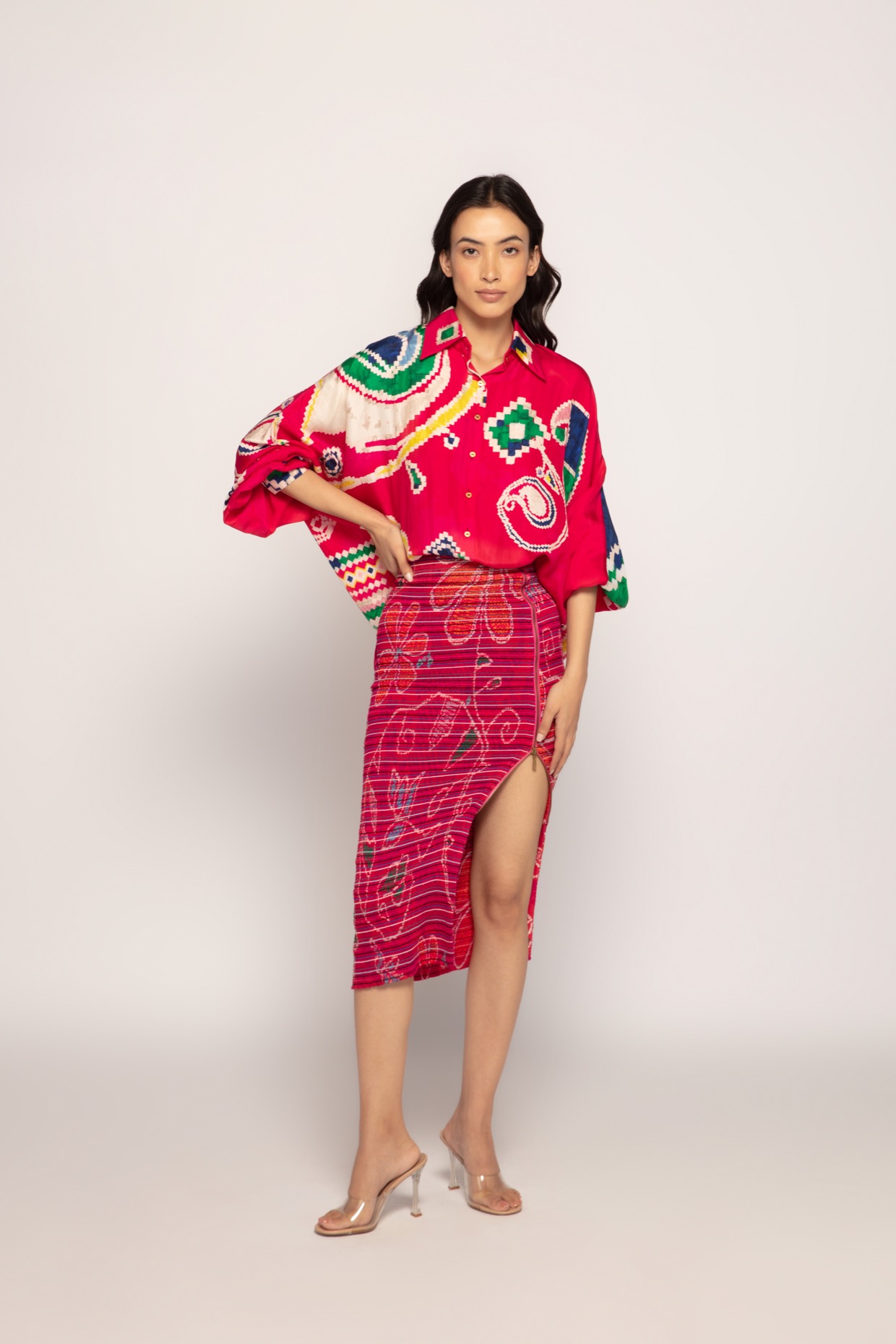 A model showcasing Paisley Print Pink Batwing Shirt by Saaksha And Kinni from Saaksha And Kinni's collection