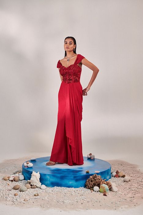 A model showcasing Corset Fitted Gown Drape In Red by One Knot One from One Knot One's collection