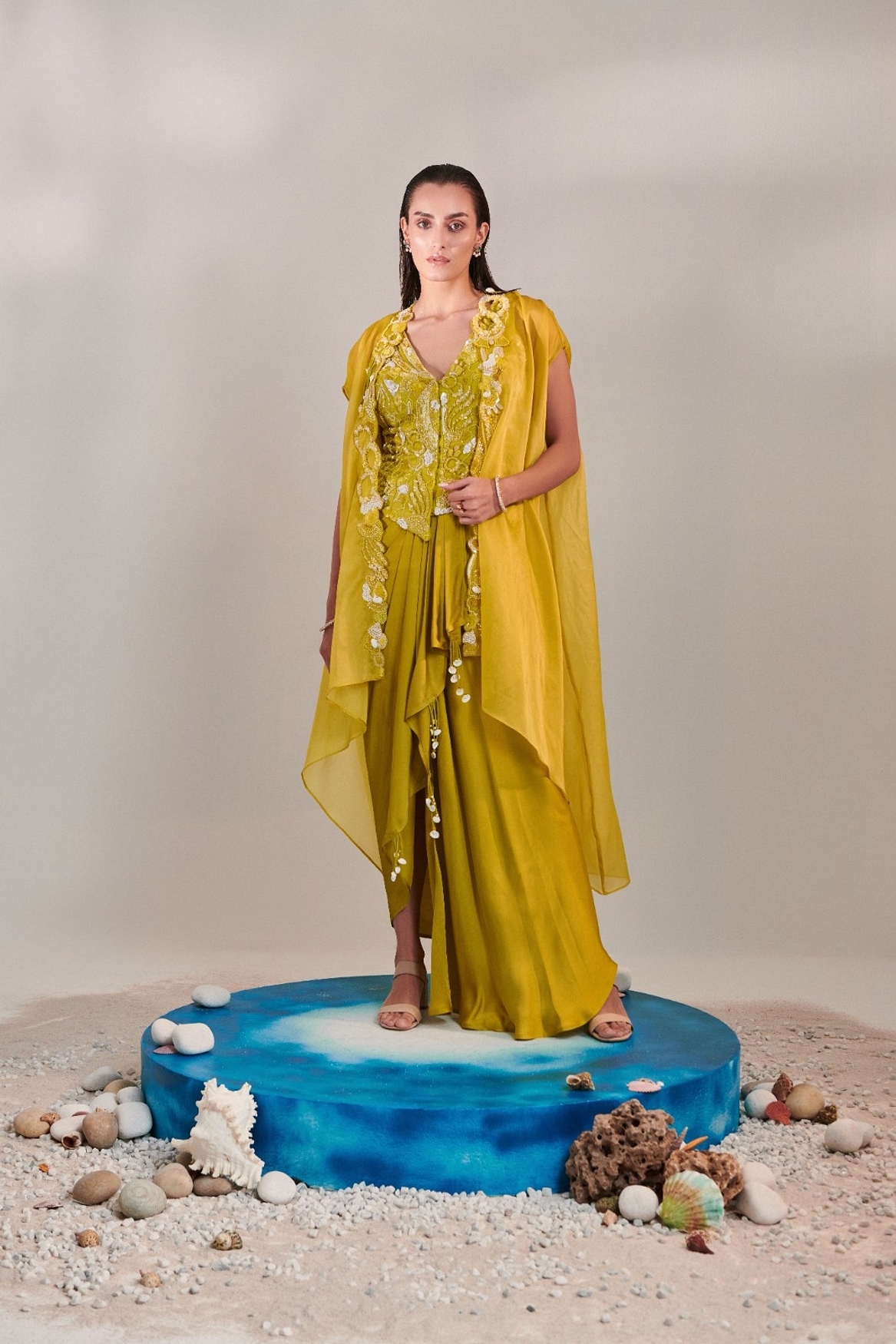 A model showcasing Skirt Set With Cape In Lime Yellow Feature image by One Knot One from One Knot One's collection