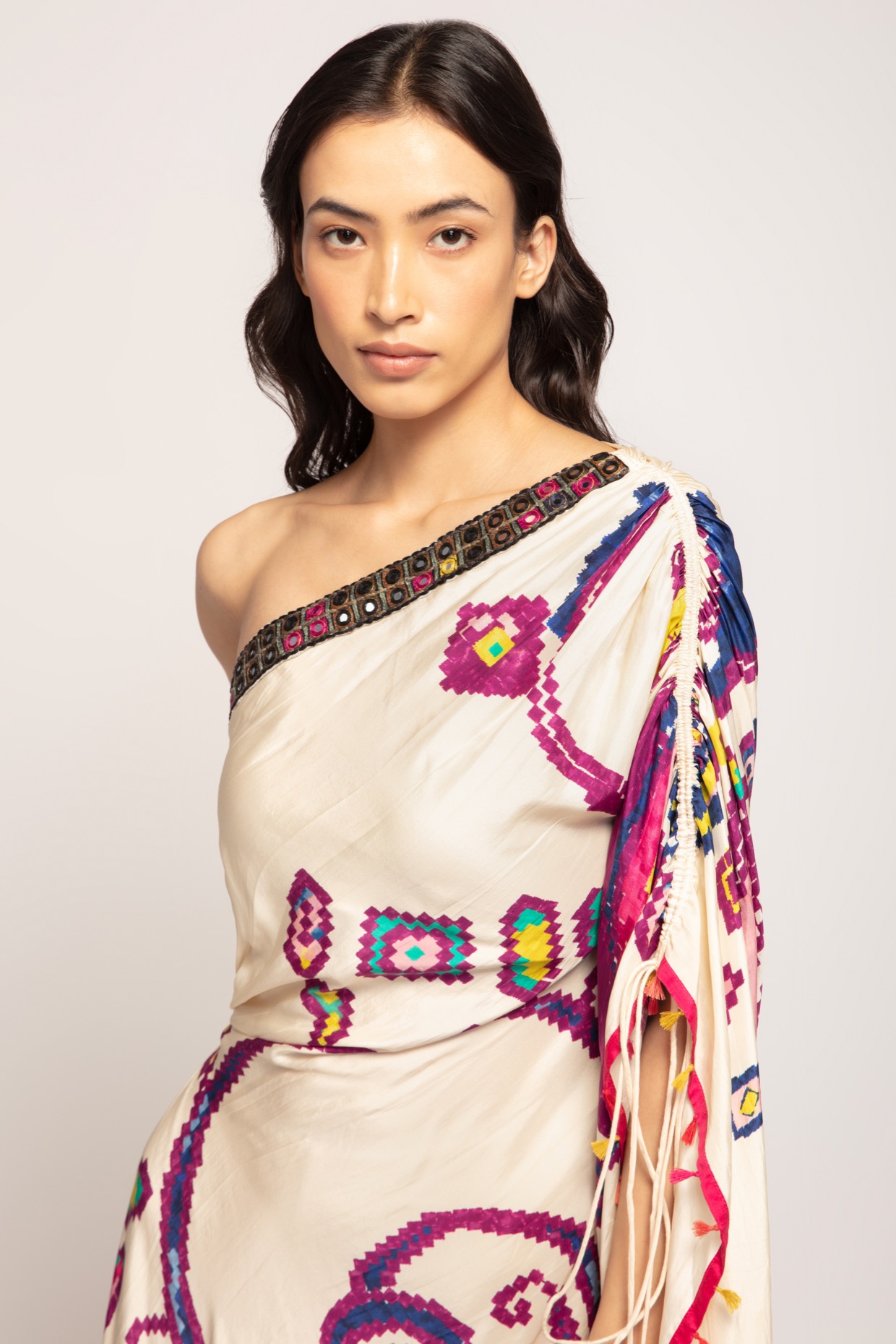 A model showcasing Marigold Print Asymmetric Kaftan Dress by Saaksha And Kinni from Saaksha And Kinni's collection