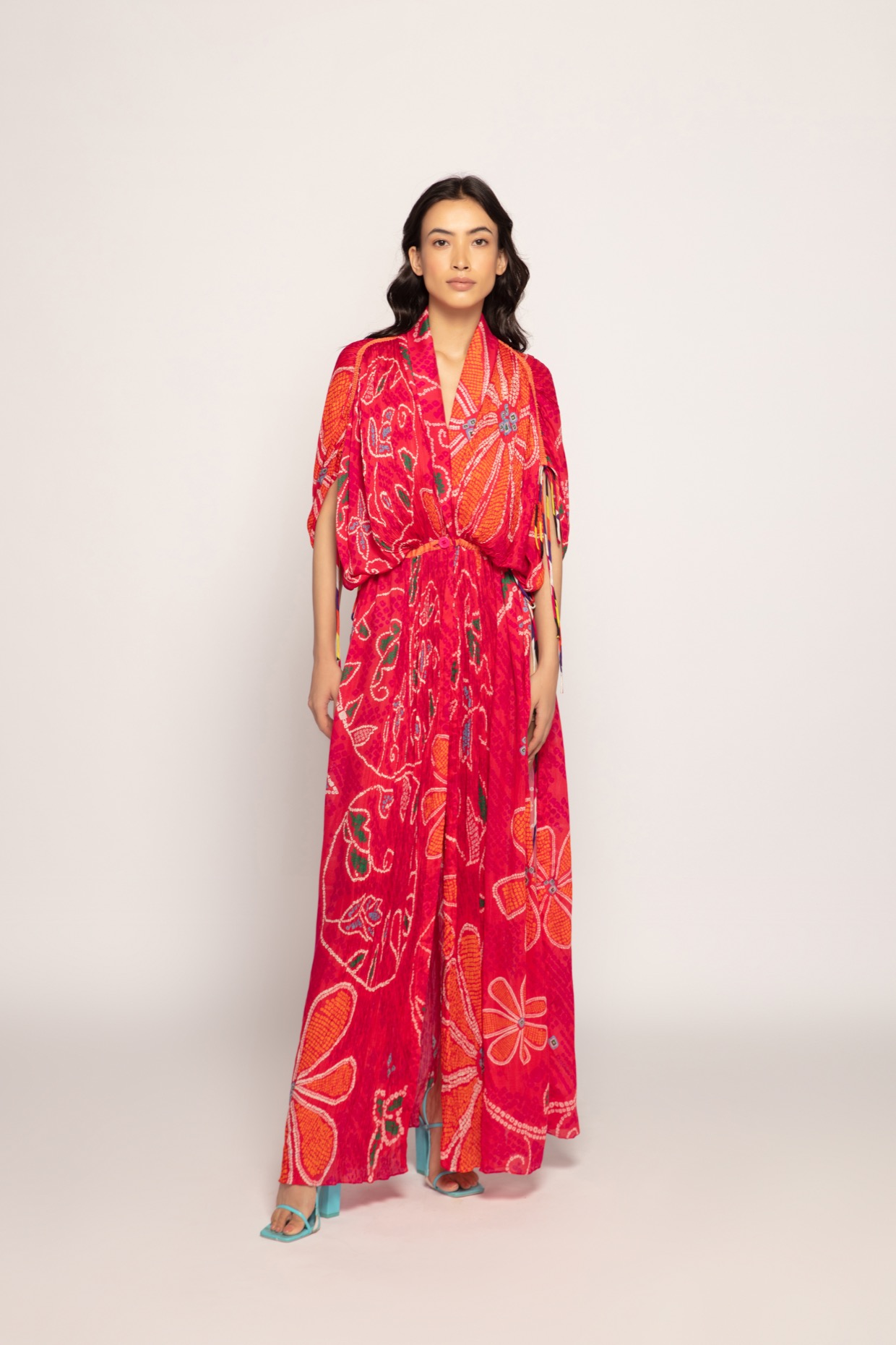 A model showcasing Marigold Bandhani Pleated Kaftan Dress Feature image by Saaksha And Kinni from Saaksha And Kinni's collection