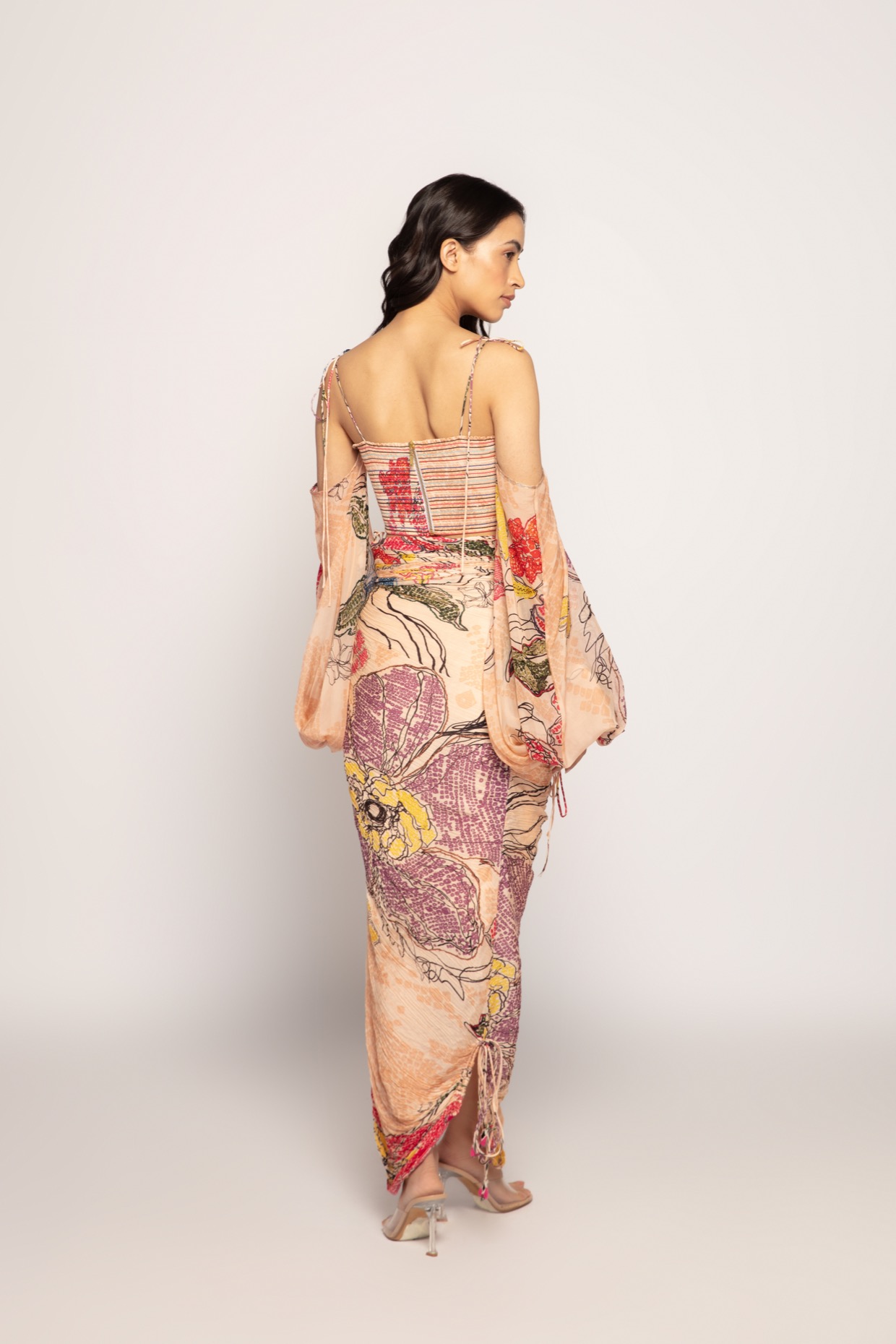 A model showcasing Peach Periwinkle Print Blouse by Saaksha And Kinni from Saaksha And Kinni's collection