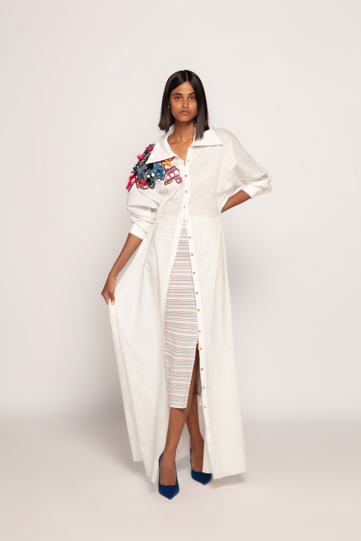 A model showcasing Stripe Print White Smocked Skirt Feature image by Saaksha And Kinni from Saaksha And Kinni's collection