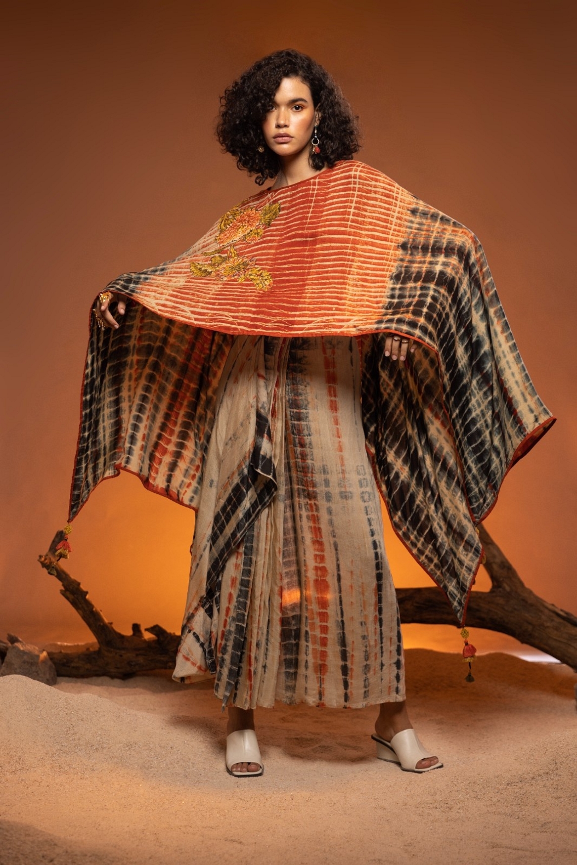 A model showcasing Orange Shikoba Indo Western Feature image by Capisvirleo from Capisvirleo's collection