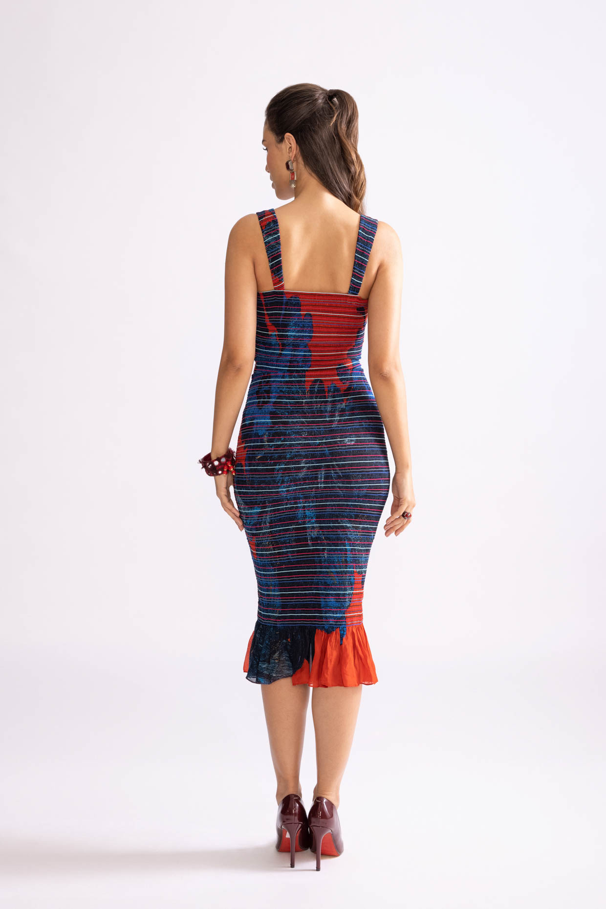 A model showcasing Sage Dress Daisy Printed Bodycon Dress by Saaksha And Kinni from Saaksha And Kinni's collection