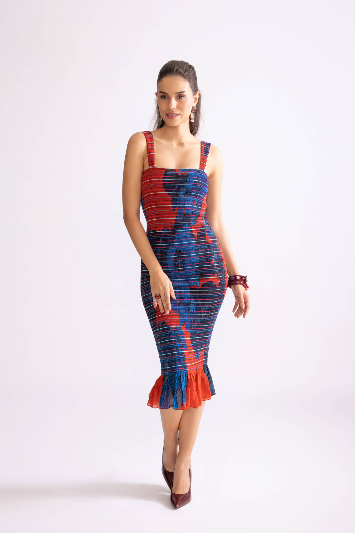 A model showcasing Sage Dress Daisy Printed Bodycon Dress by Saaksha And Kinni from Saaksha And Kinni's collection
