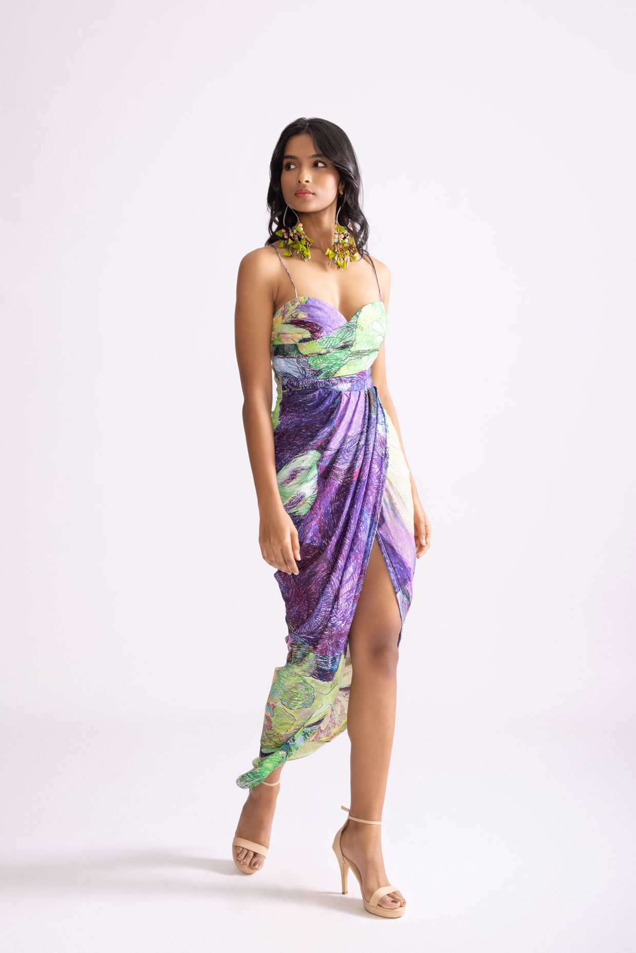 A model showcasing Aura Dress Daisy Printed Draped Dress by Saaksha And Kinni from Saaksha And Kinni's collection
