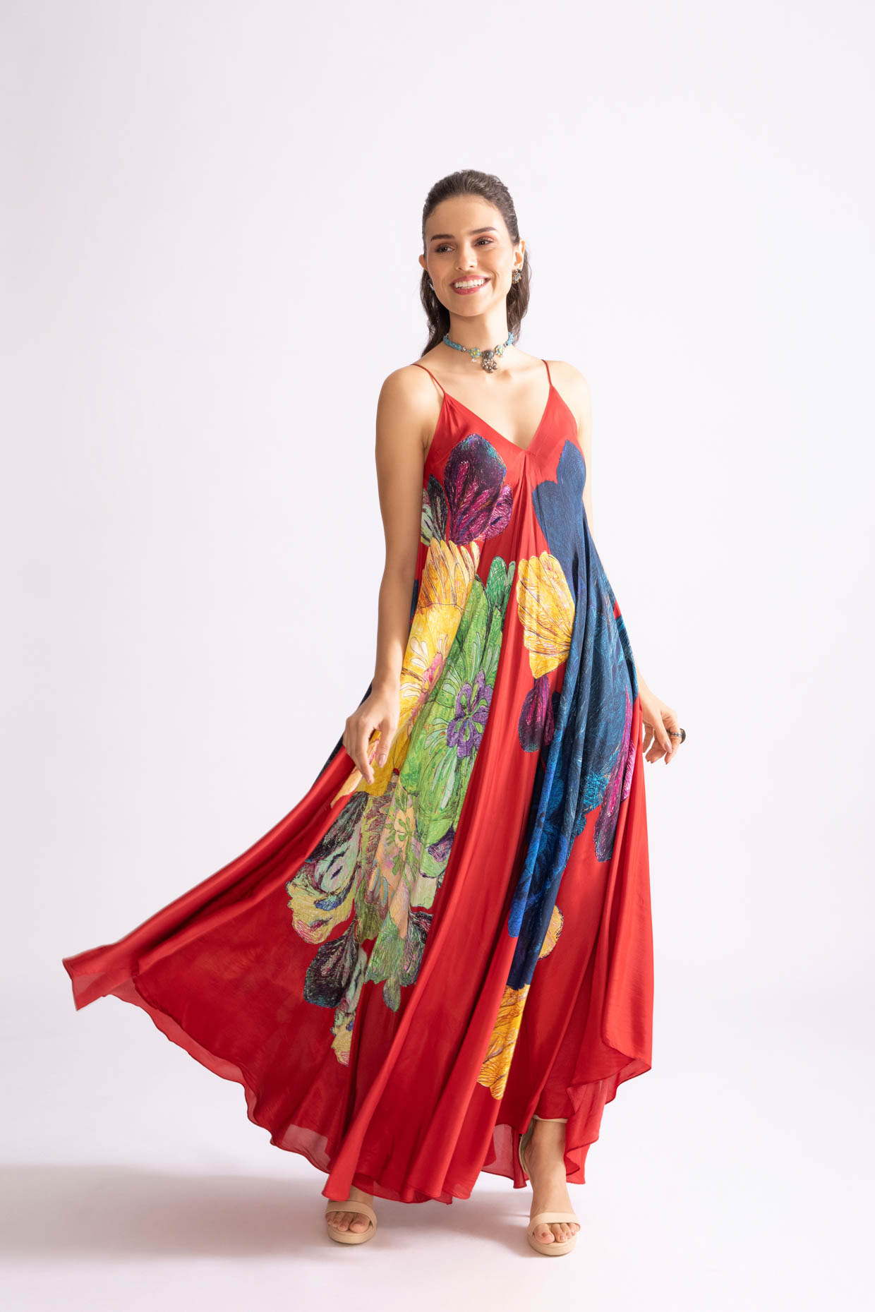 A model showcasing Yazmine Dress Daisy Print Asymmetric Dress by Saaksha And Kinni from Saaksha And Kinni's collection