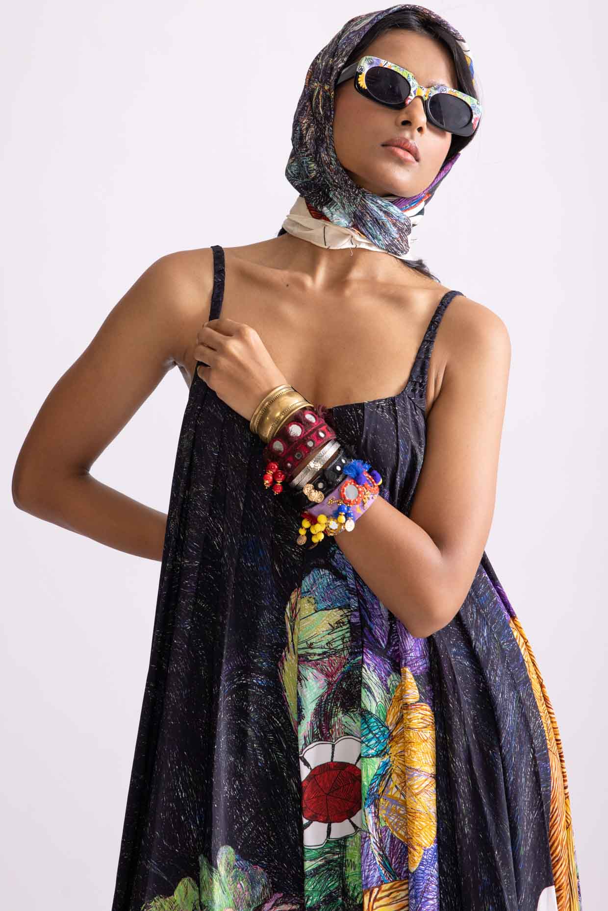 A model showcasing Swing Dress Tribal Print Flared Maxi Dress by Saaksha And Kinni from Saaksha And Kinni's collection