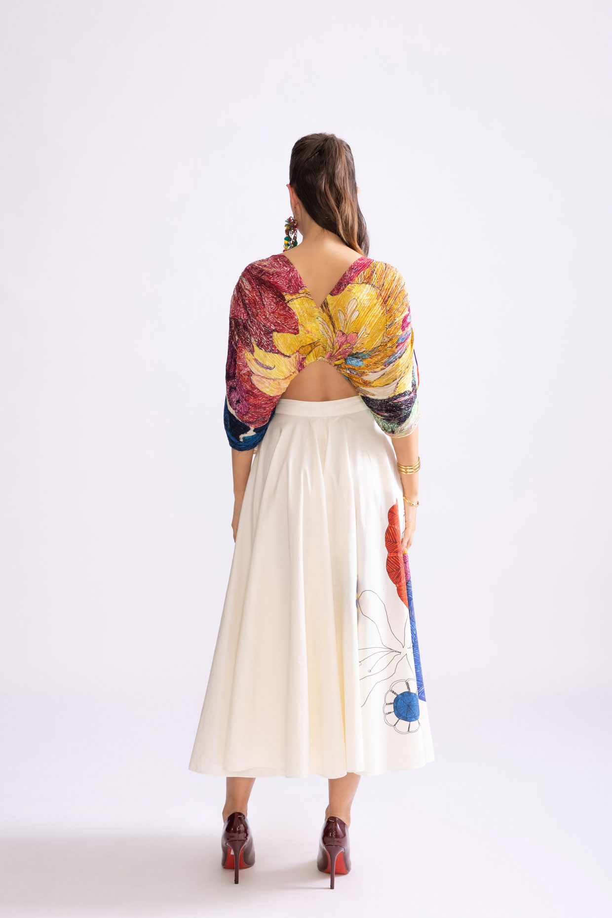 A model showcasing Alaia Blouse Daisy Print Kaftan Style Blouse by Saaksha And Kinni from Saaksha And Kinni's collection