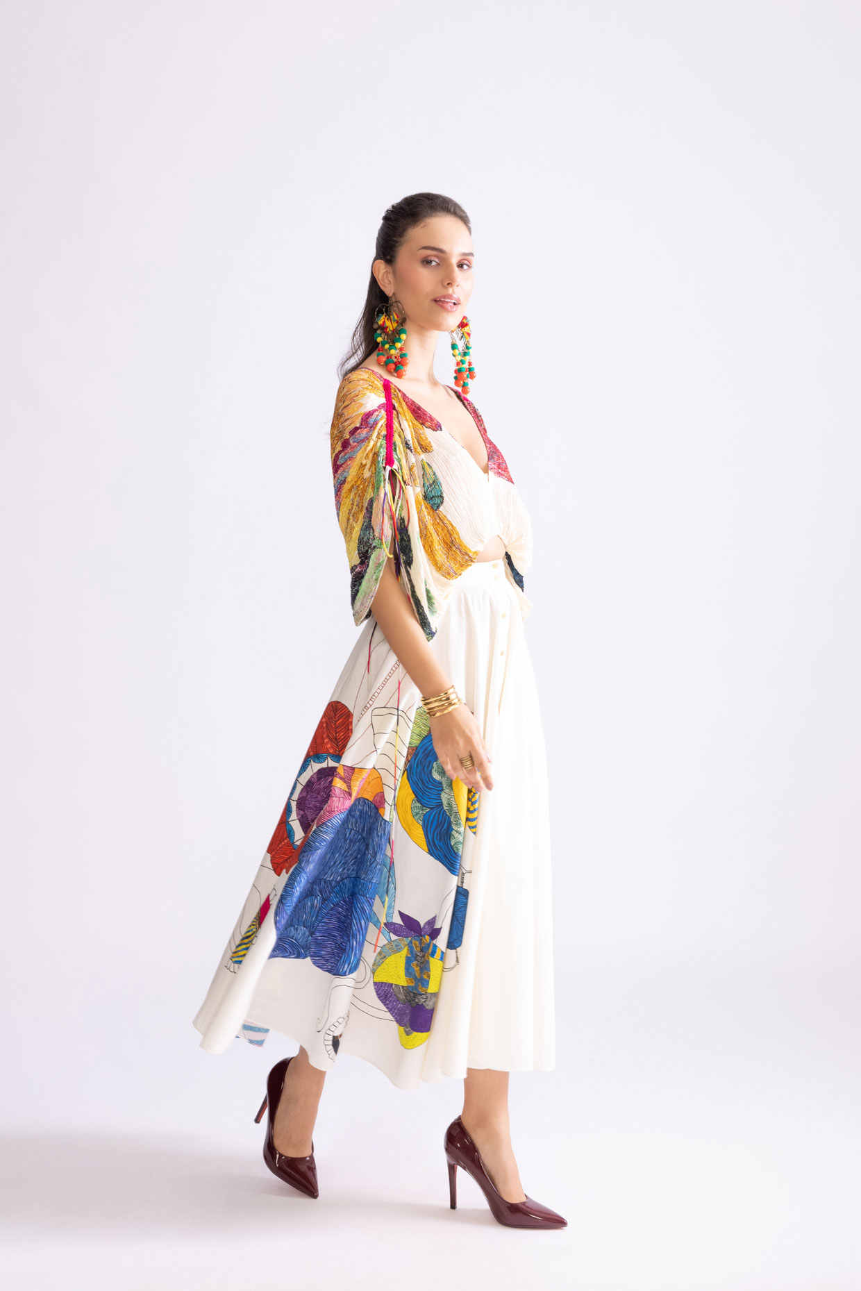 A model showcasing Alaia Blouse Daisy Print Kaftan Style Blouse by Saaksha And Kinni from Saaksha And Kinni's collection