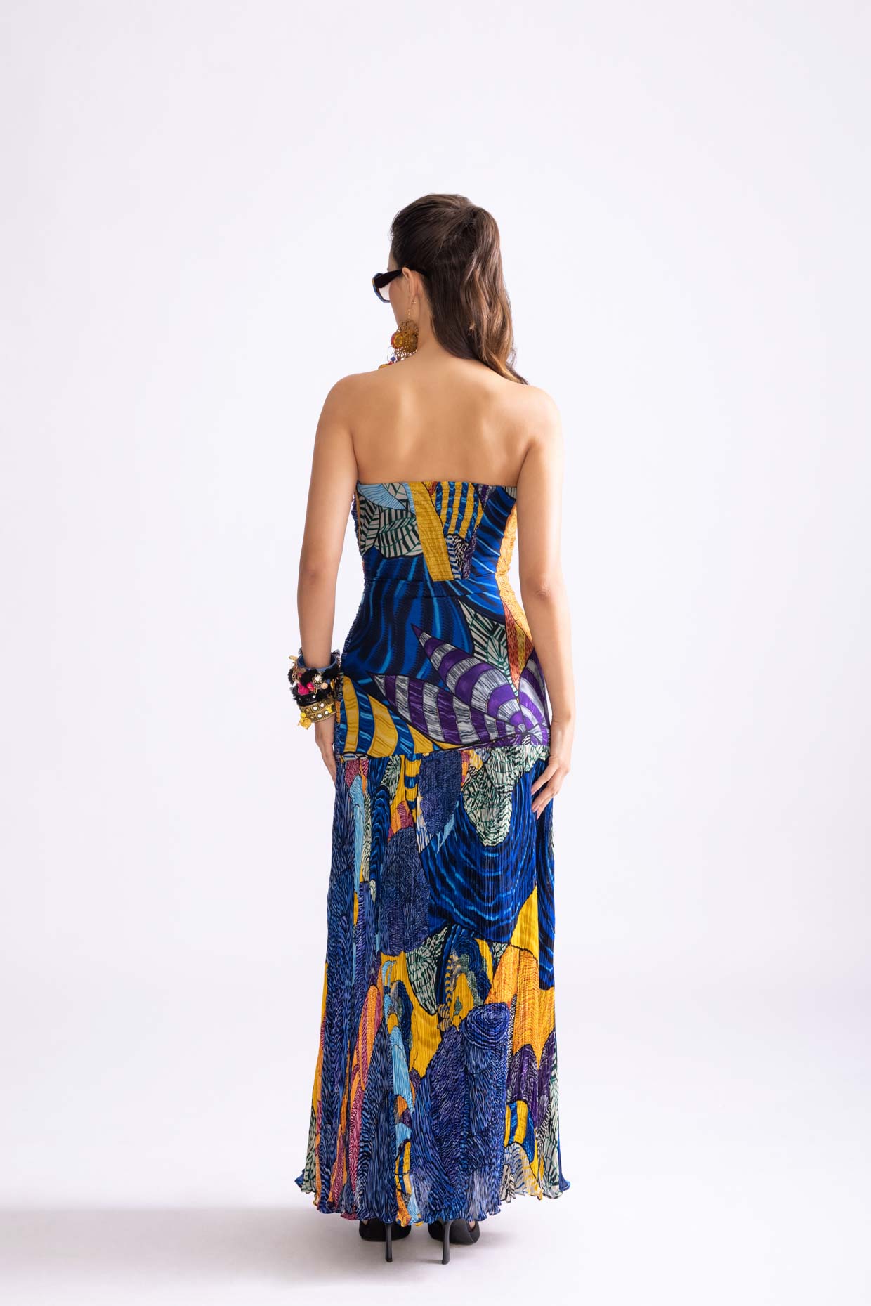 A model showcasing Jennifer Dress Tribal Print Gown by Saaksha And Kinni from Saaksha And Kinni's collection