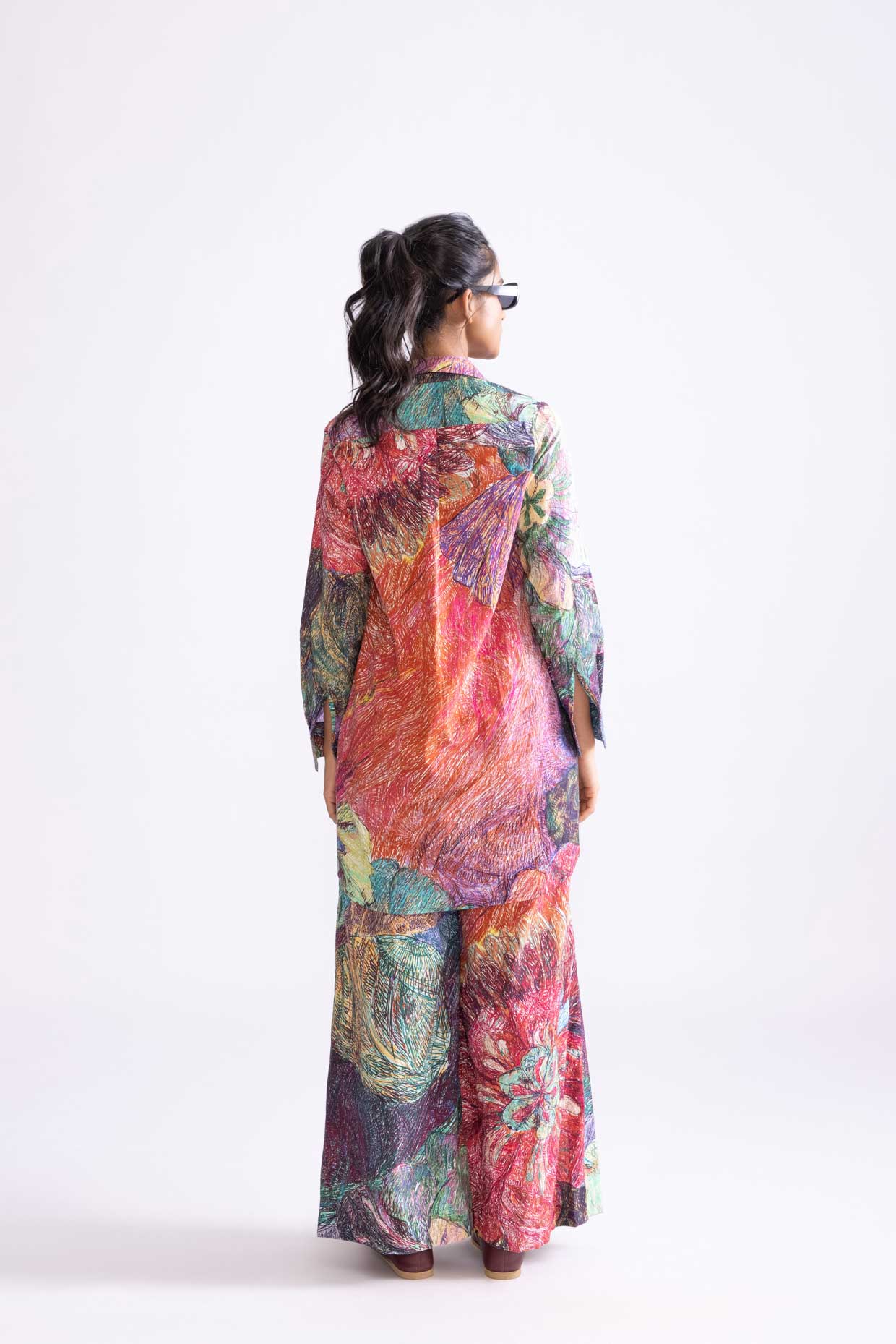 A model showcasing Everly Shirt Daisy Print Collared Shirt by Saaksha And Kinni from Saaksha And Kinni's collection