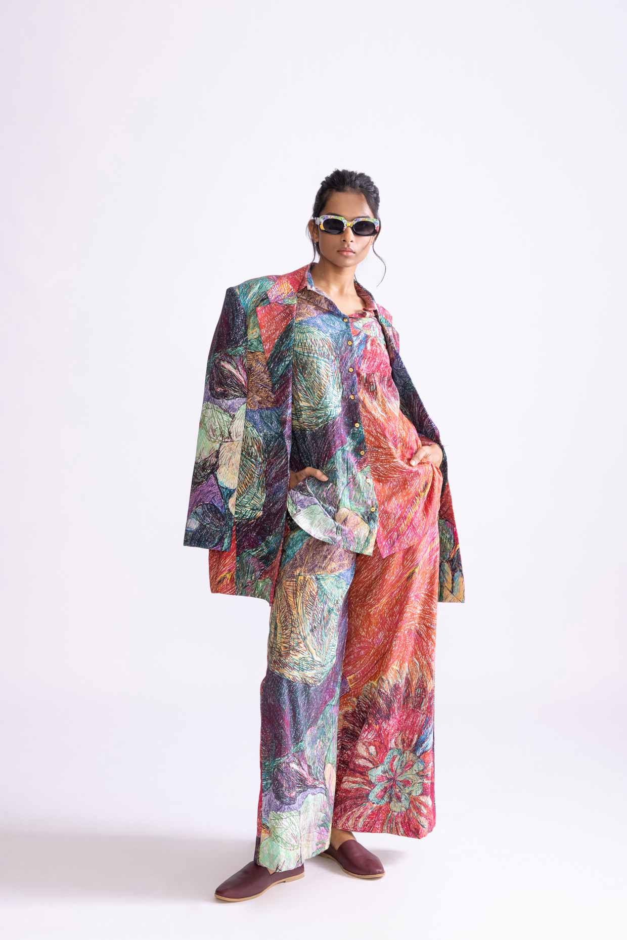 A model showcasing Everly Shirt Daisy Print Collared Shirt by Saaksha And Kinni from Saaksha And Kinni's collection