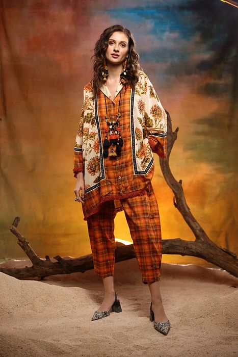 A model showcasing Ivory Oakwood Coord Set by Capisvirleo from Capisvirleo's collection