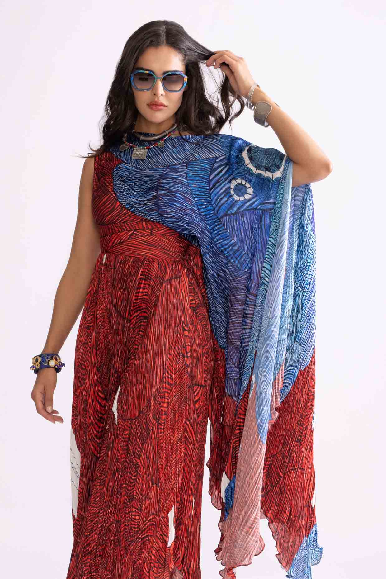 A model showcasing Abigail Dress Wave Print Micro Pleat Dress by Saaksha And Kinni from Saaksha And Kinni's collection