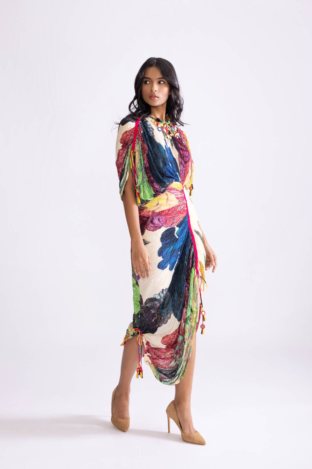 A model showcasing Zia Dress Daisy Print Kaftan Dress by Saaksha And Kinni from Saaksha And Kinni's collection