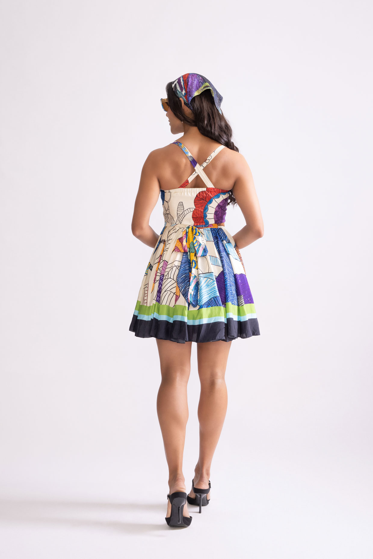 A model showcasing Ballerina Dress Tribal Print Flared Mini Dress by Saaksha And Kinni from Saaksha And Kinni's collection
