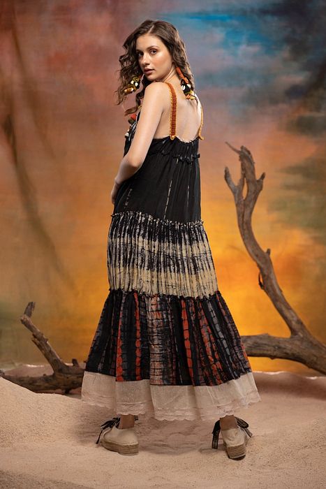 A model showcasing Black Ebony Dress by Capisvirleo from Capisvirleo's collection