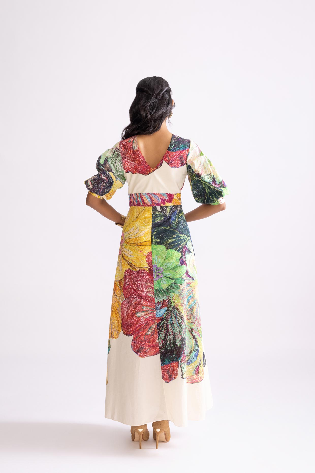 A model showcasing Daisy Dress Daisy Print A Line Dress by Saaksha And Kinni from Saaksha And Kinni's collection