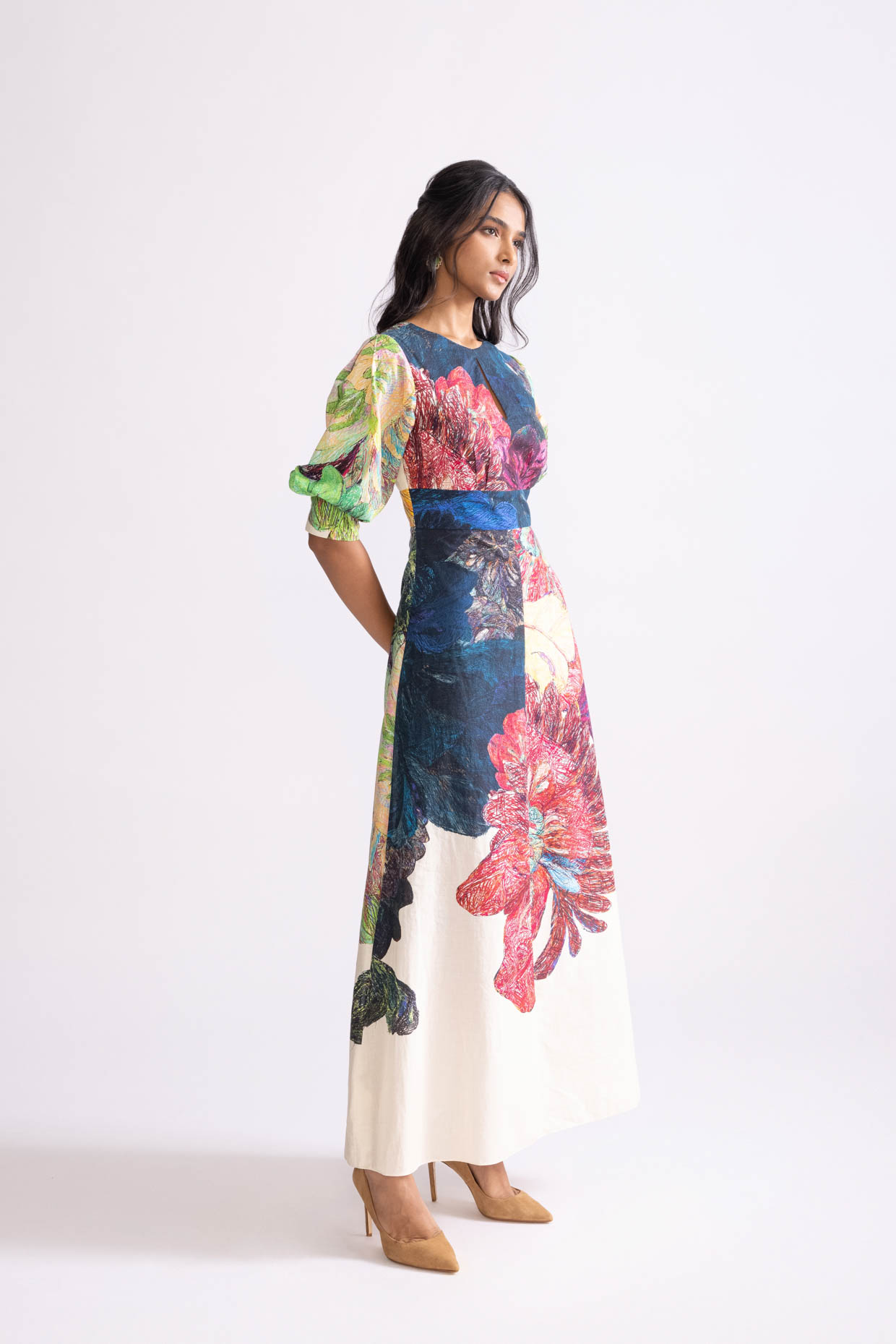 A model showcasing Daisy Dress Daisy Print A Line Dress by Saaksha And Kinni from Saaksha And Kinni's collection