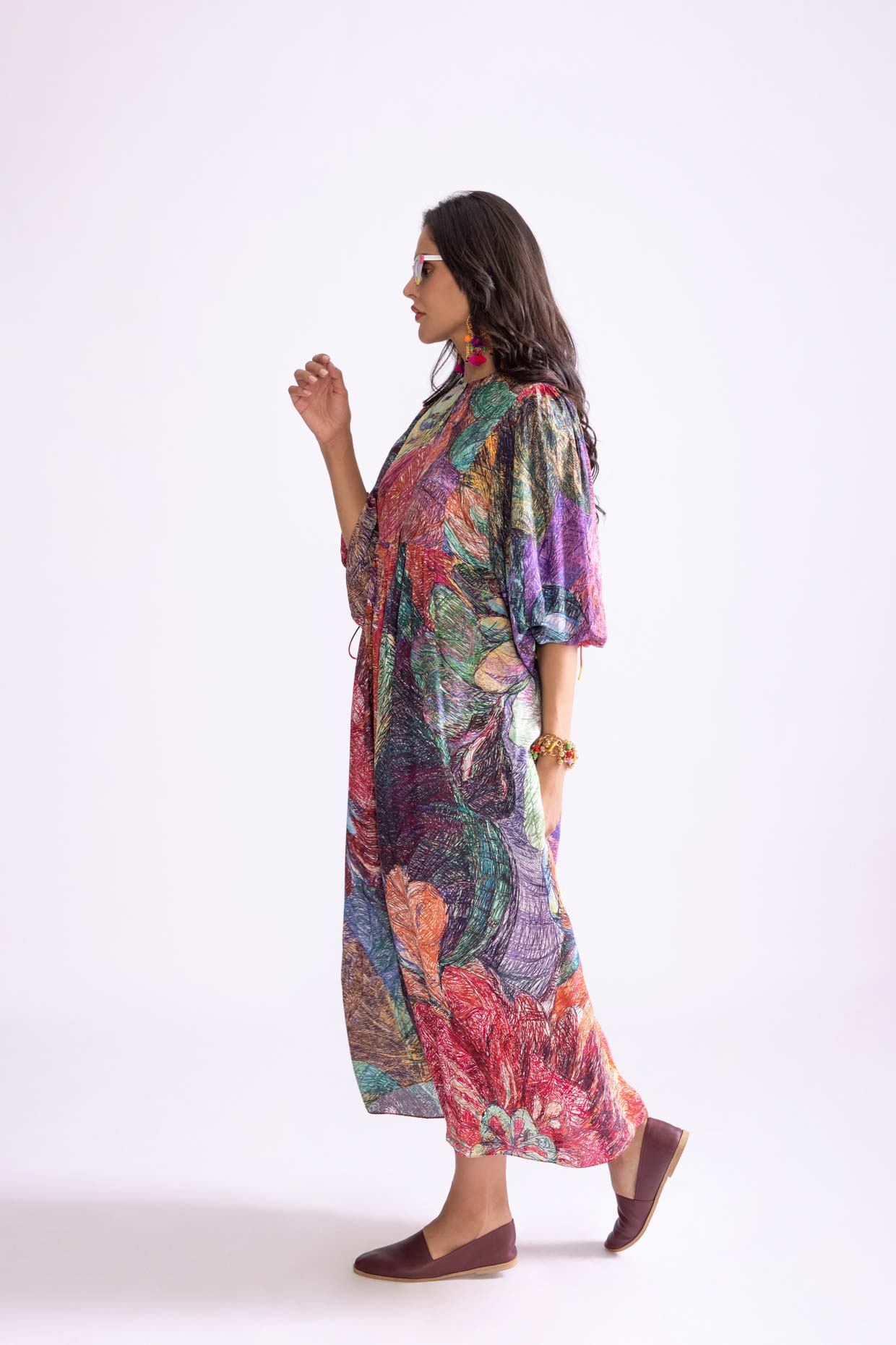 A model showcasing Sara Dress Daisy Print Dress by Saaksha And Kinni from Saaksha And Kinni's collection