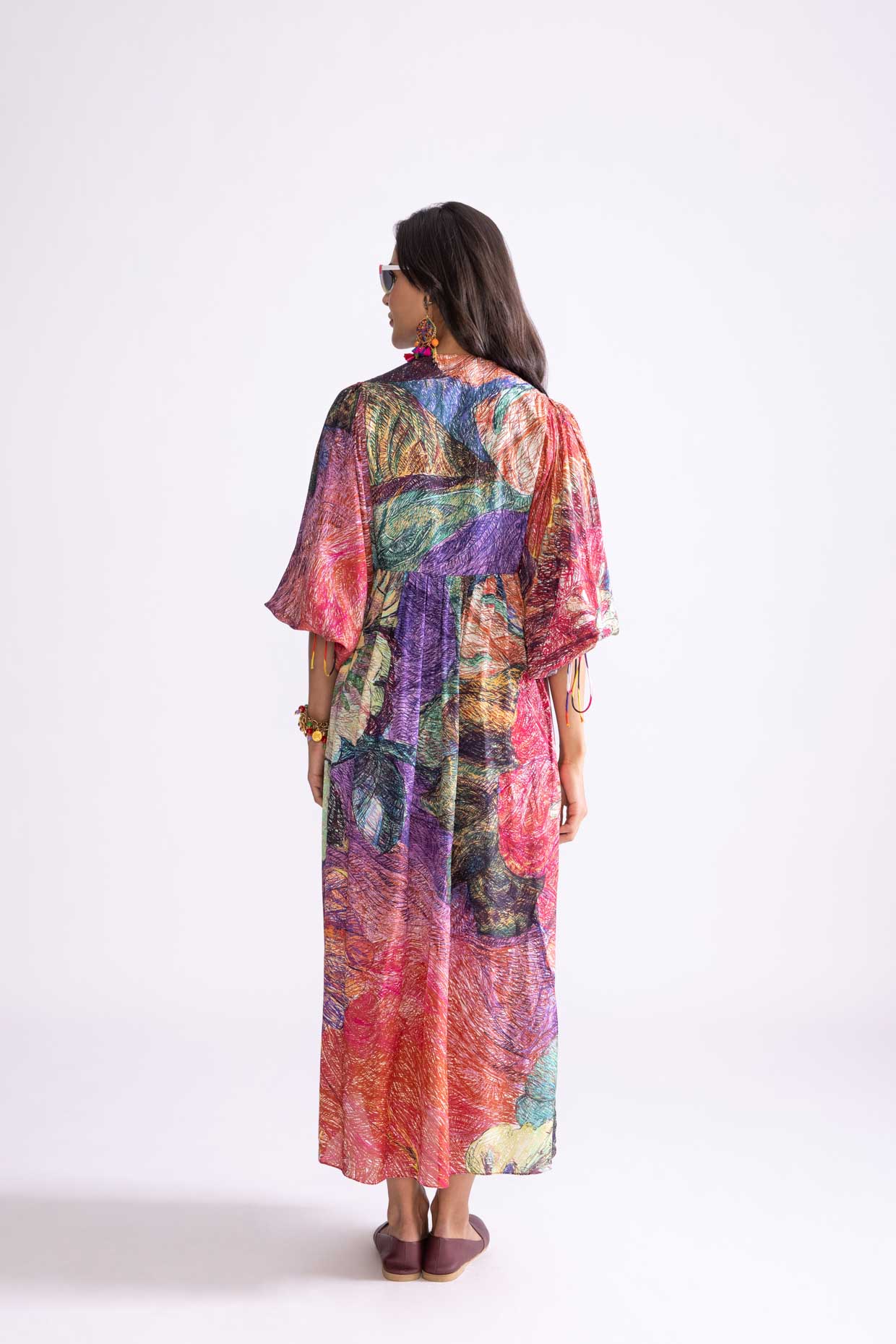 A model showcasing Sara Dress Daisy Print Dress by Saaksha And Kinni from Saaksha And Kinni's collection