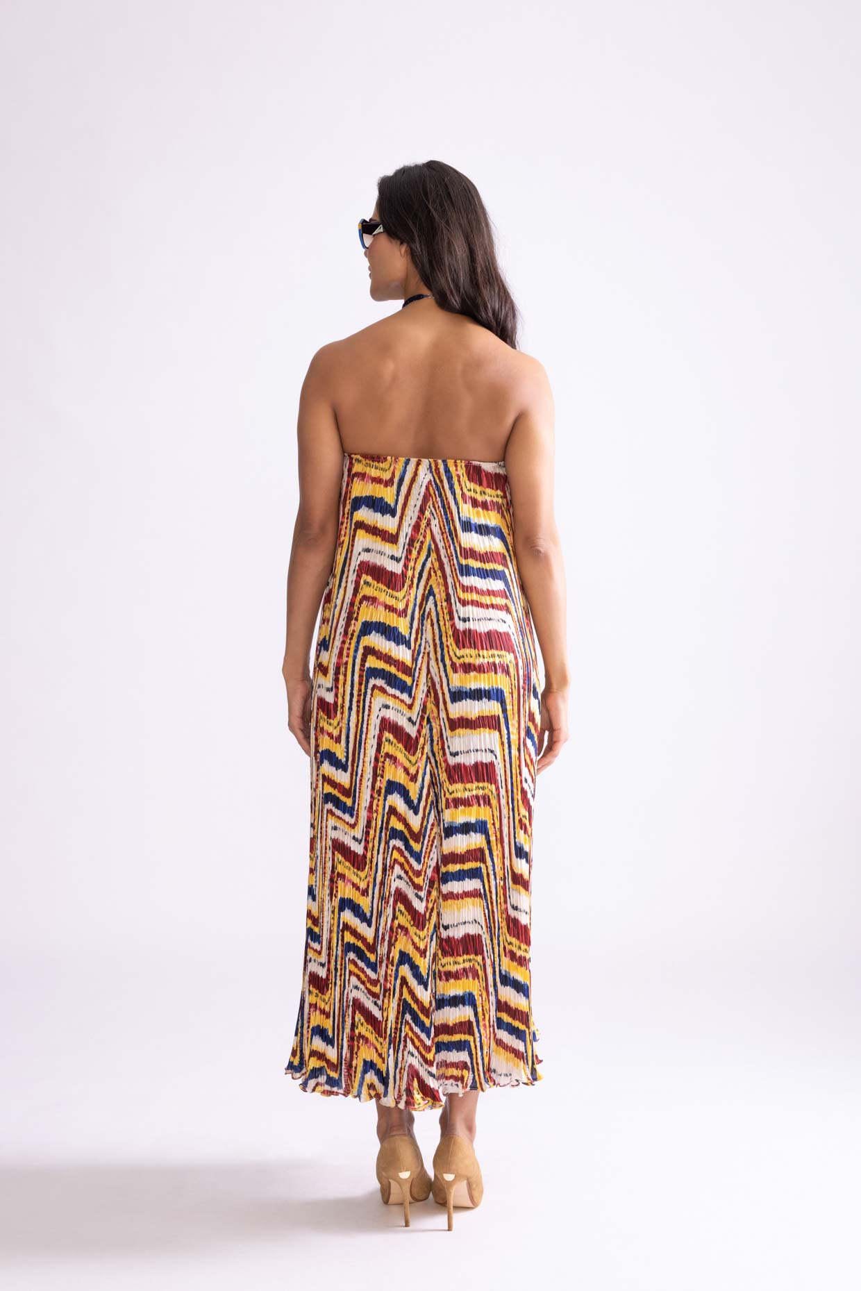 A model showcasing Tova Dress Zigzag Print Maxi Dress by Saaksha And Kinni from Saaksha And Kinni's collection