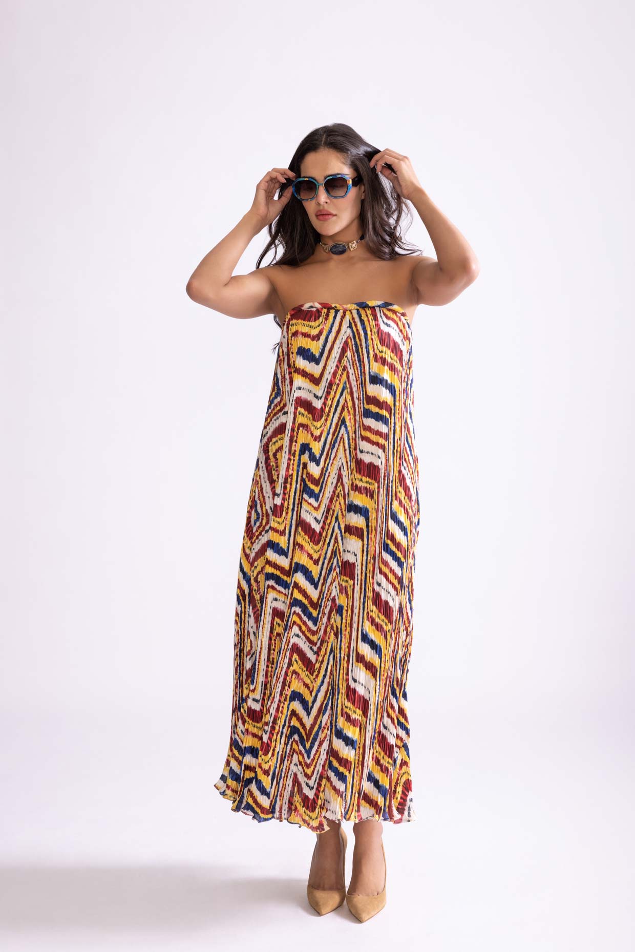 A model showcasing Tova Dress Zigzag Print Maxi Dress by Saaksha And Kinni from Saaksha And Kinni's collection