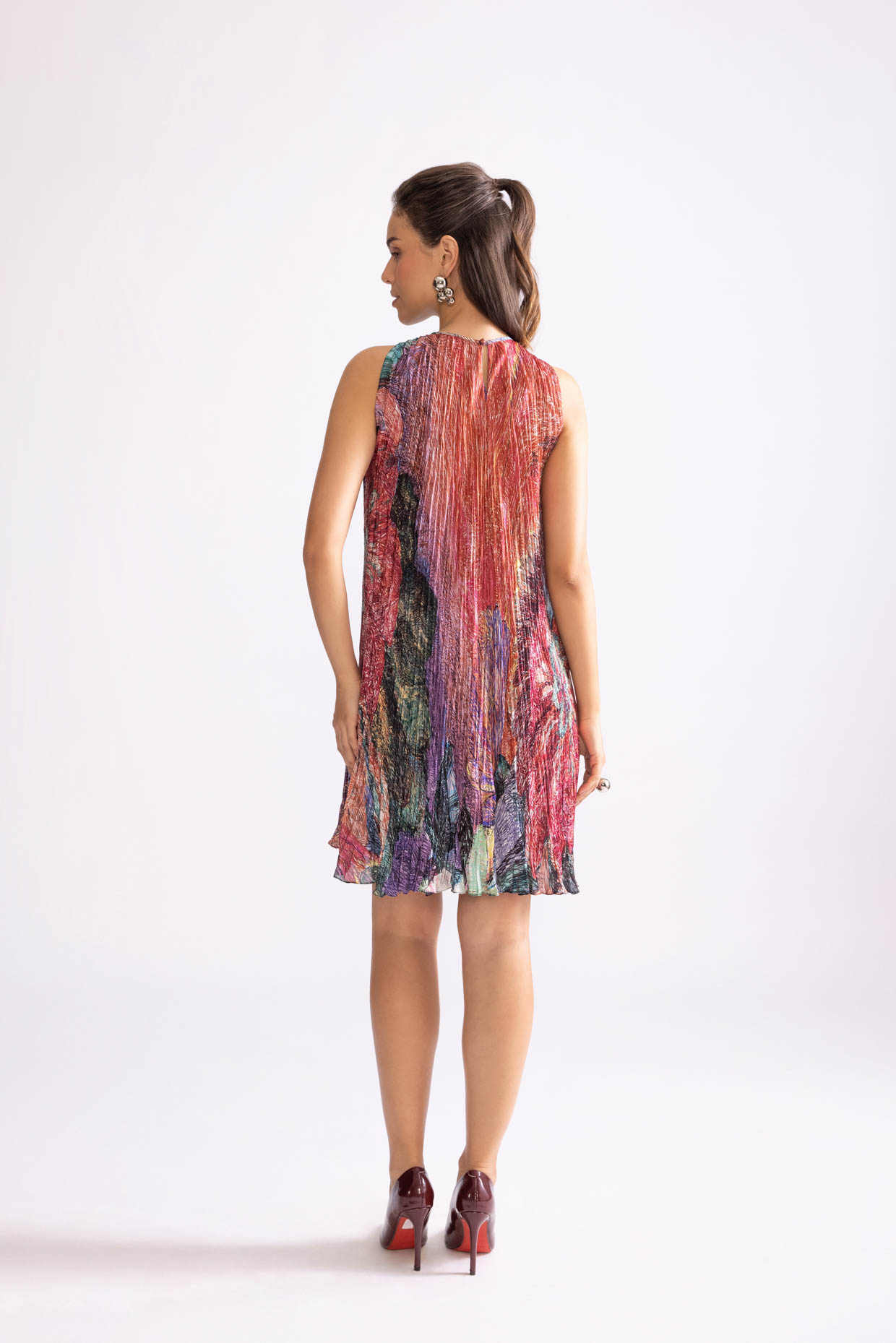 A model showcasing Maisy Dress Daisy Print Dress by Saaksha And Kinni from Saaksha And Kinni's collection