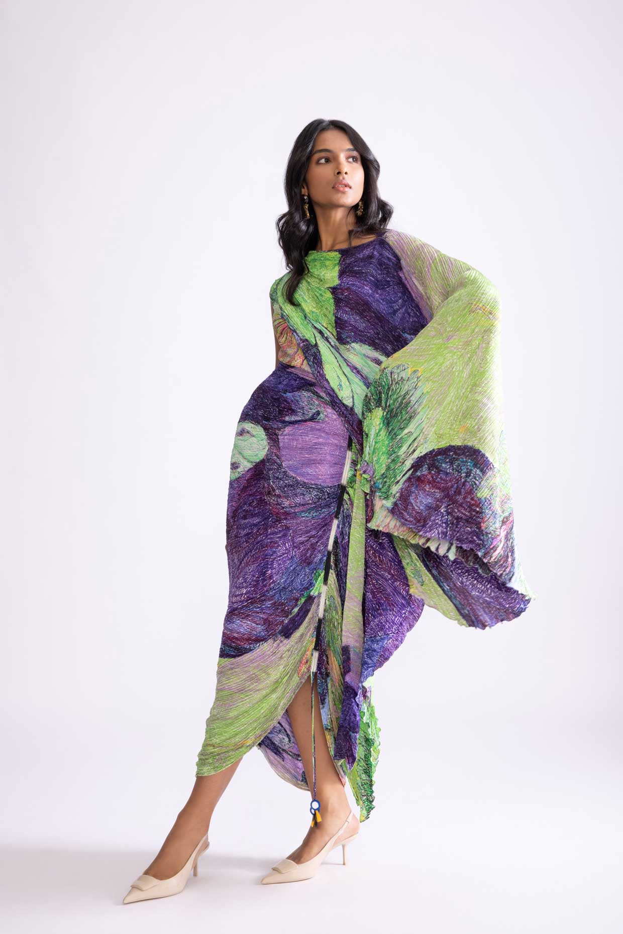 A model showcasing Kathy Dress Daisy Print Kaftan Dress by Saaksha And Kinni from Saaksha And Kinni's collection