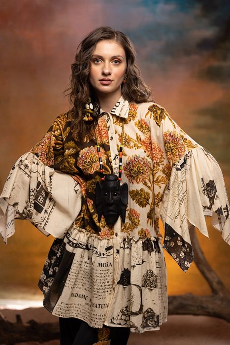 A model showcasing Ivory Tamarind Dress by Capisvirleo from Capisvirleo's collection