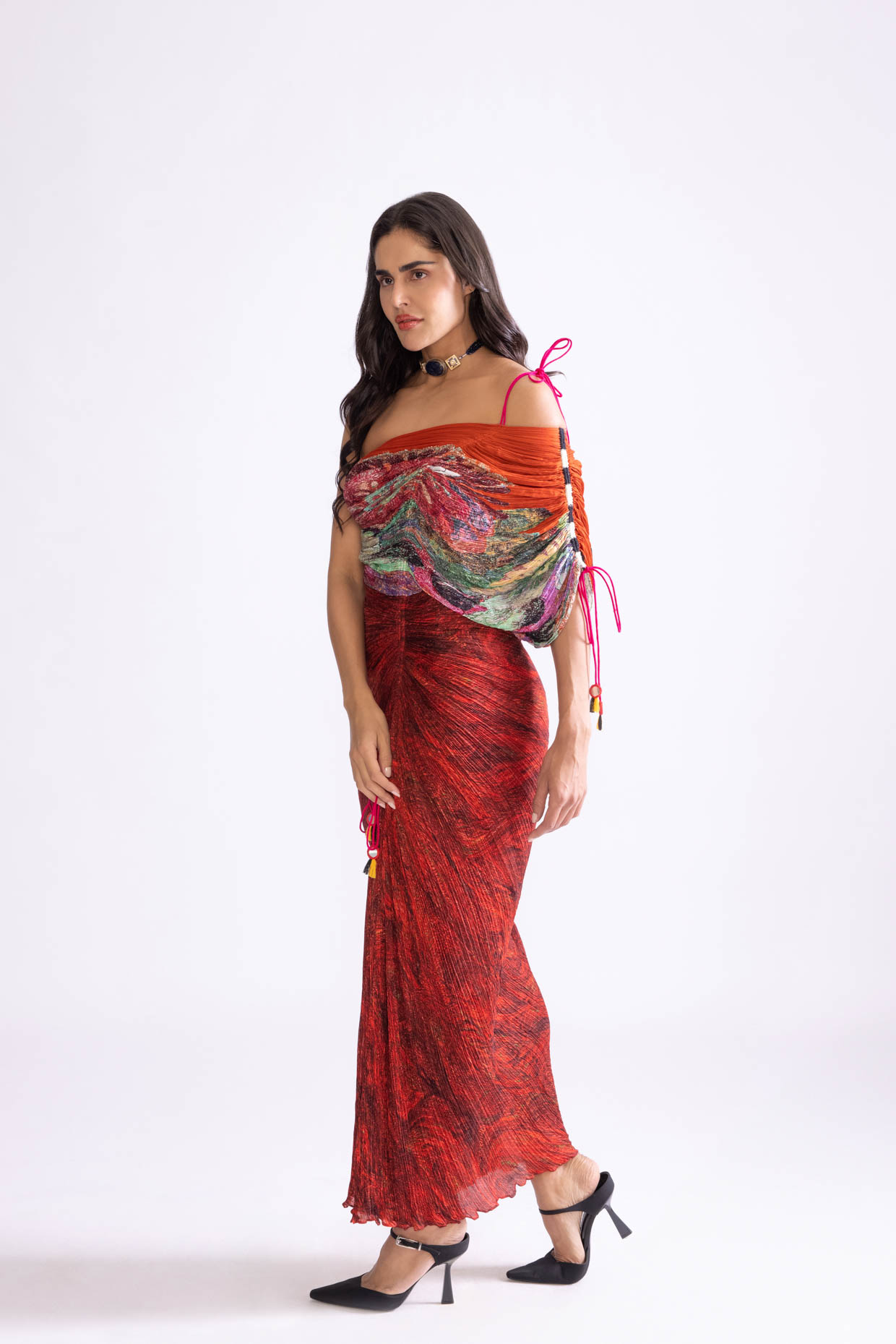 A model showcasing Raleigh Dress Wave And Daisy Print Red Maxi Dress by Saaksha And Kinni from Saaksha And Kinni's collection