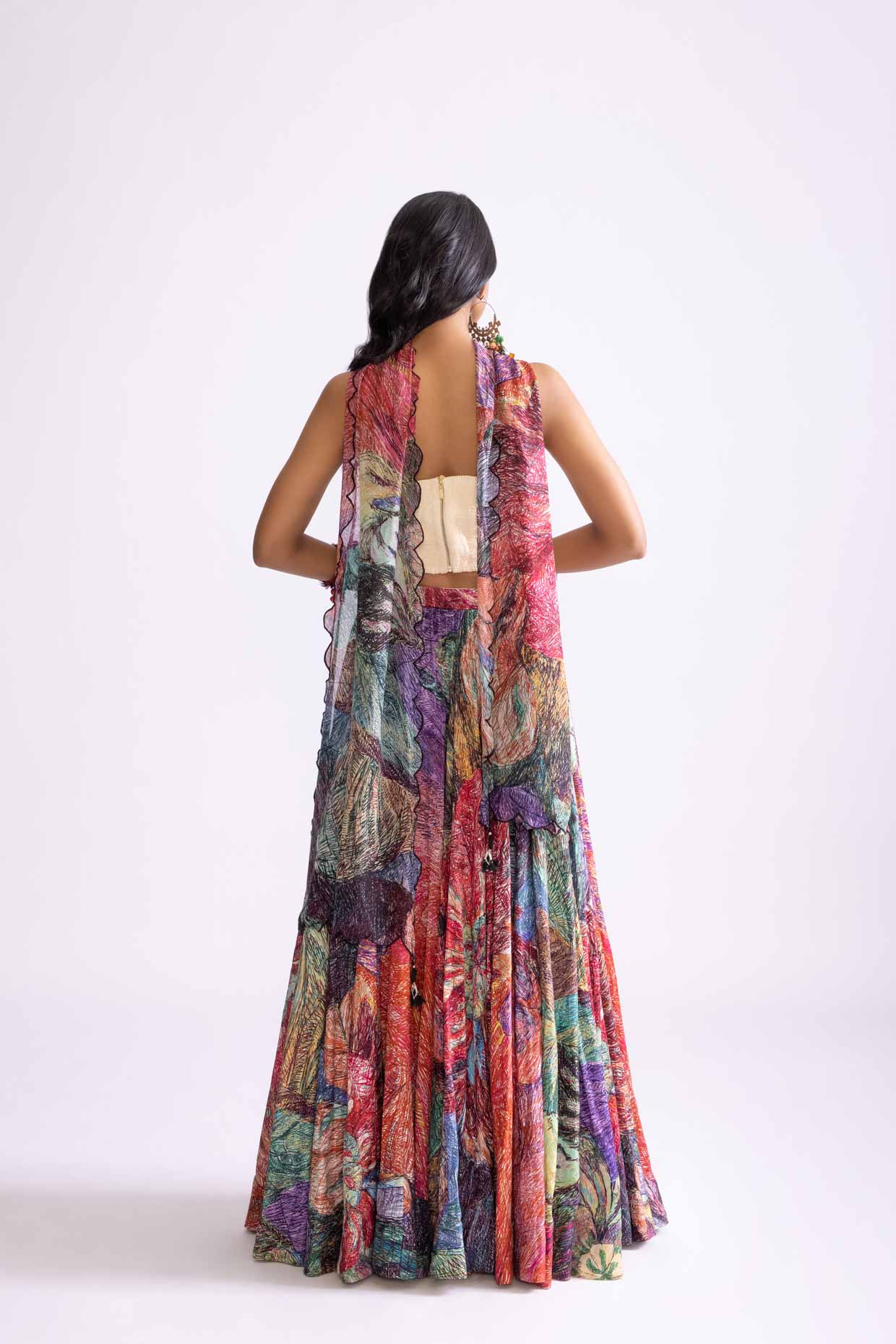 A model showcasing Multi Coloured Scallop Dupatta by Saaksha And Kinni from Saaksha And Kinni's collection