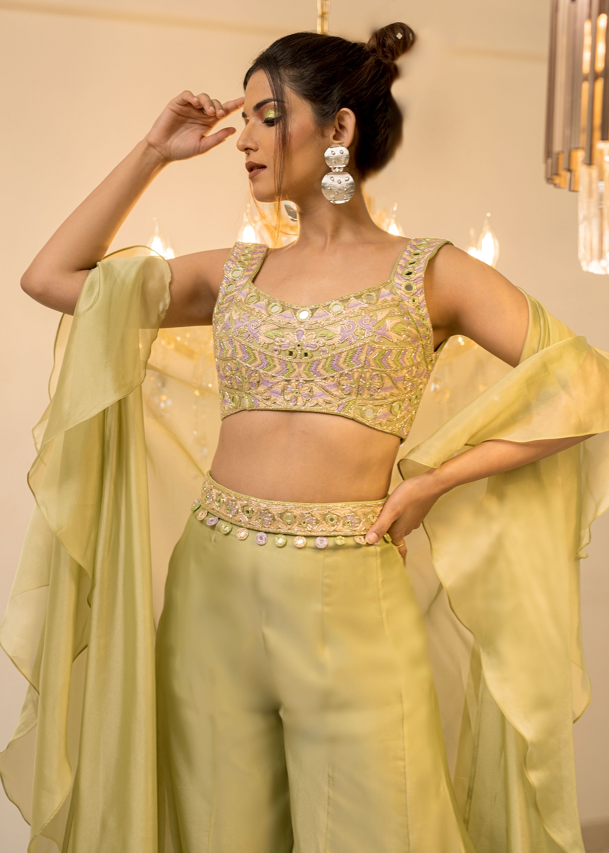 A model showcasing Green Organza Sharara Cape Set Feature image by Foram Patel from Foram Patel's collection