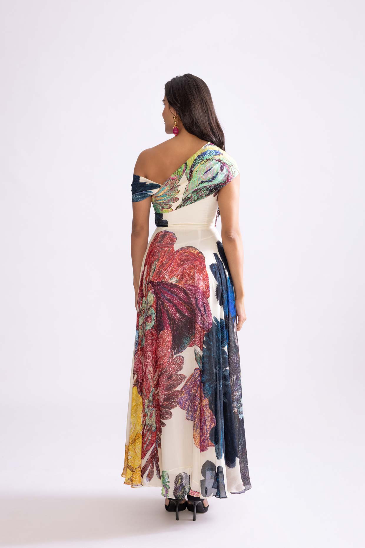 A model showcasing Madeline Dress Daisy Print Dress by Saaksha And Kinni from Saaksha And Kinni's collection